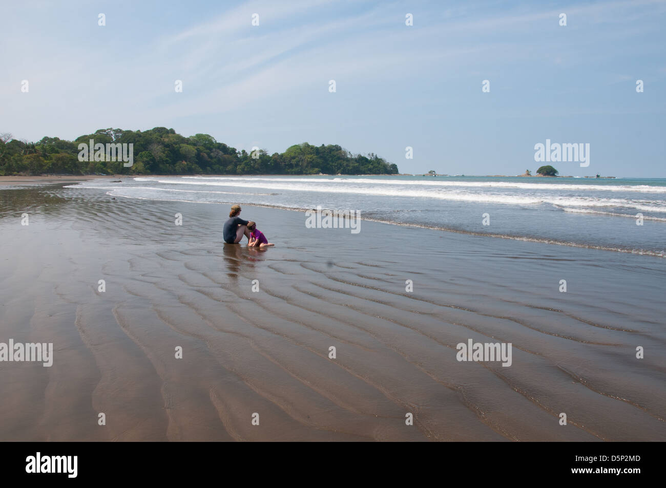 Vacationers at Dominical beach Puntaraneas Pacific Ocean Costa Rica Stock Photo