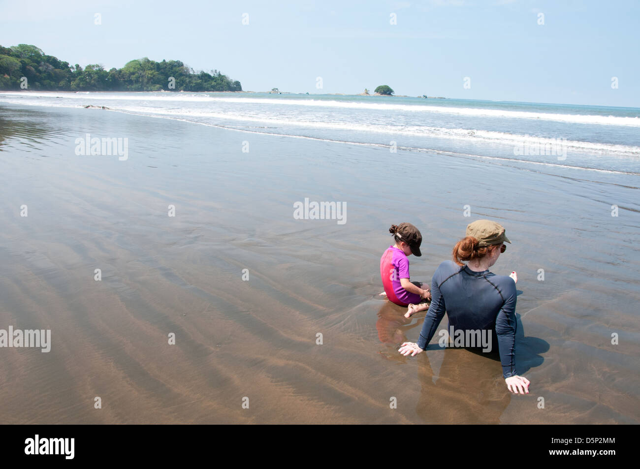 Vacationers at Dominical beach Puntaraneas Pacific Ocean Costa Rica Stock Photo