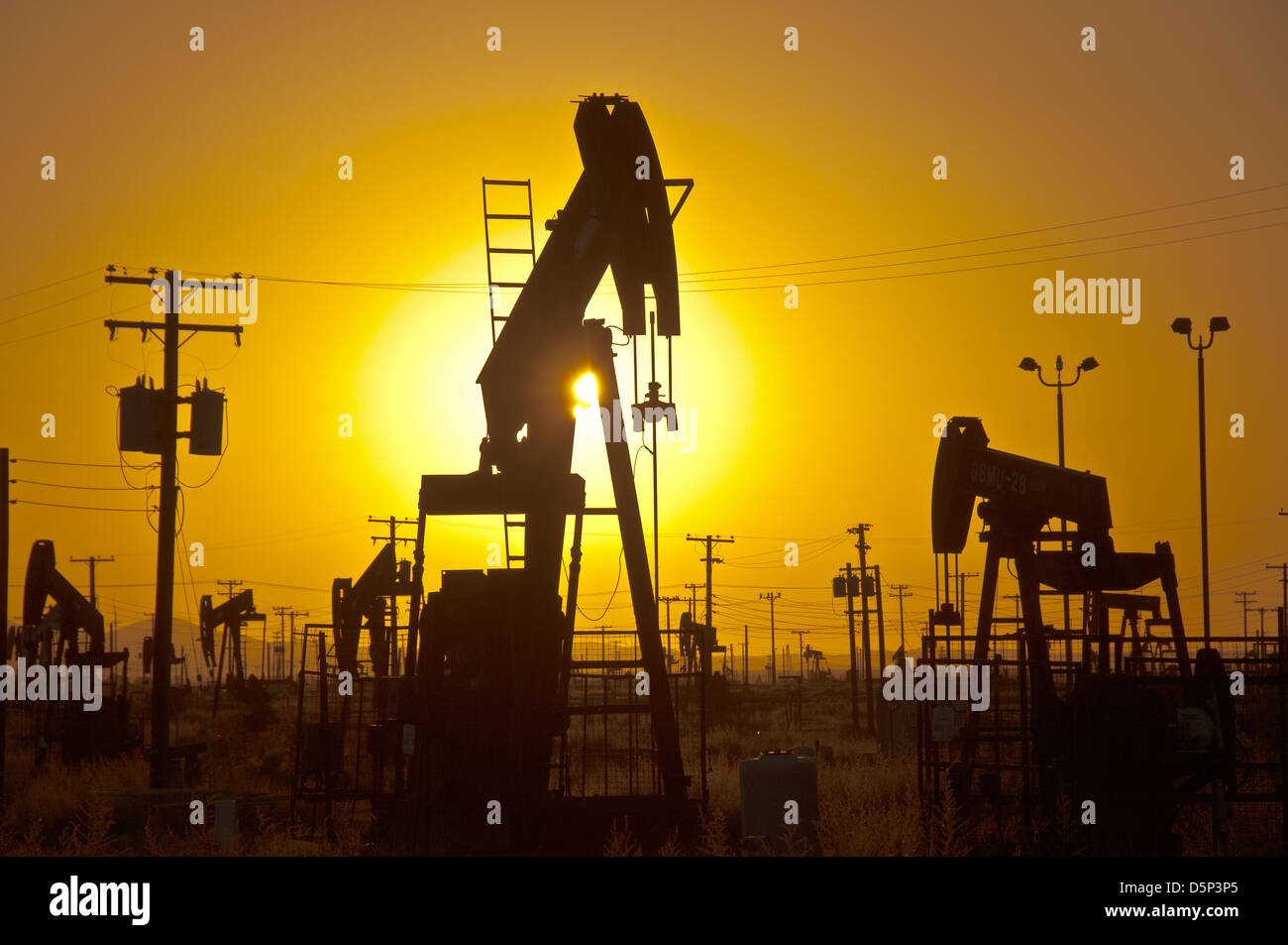 Oil pumps at sunset in California Stock Photo Alamy