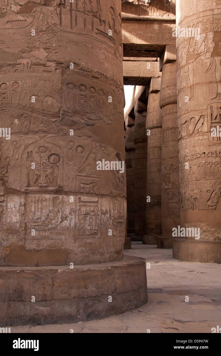Pillars of the Great Hypostyle Hall of Karnak in the Karnal temple complex in the Precinct of Amun-Re Luxor Stock Photo