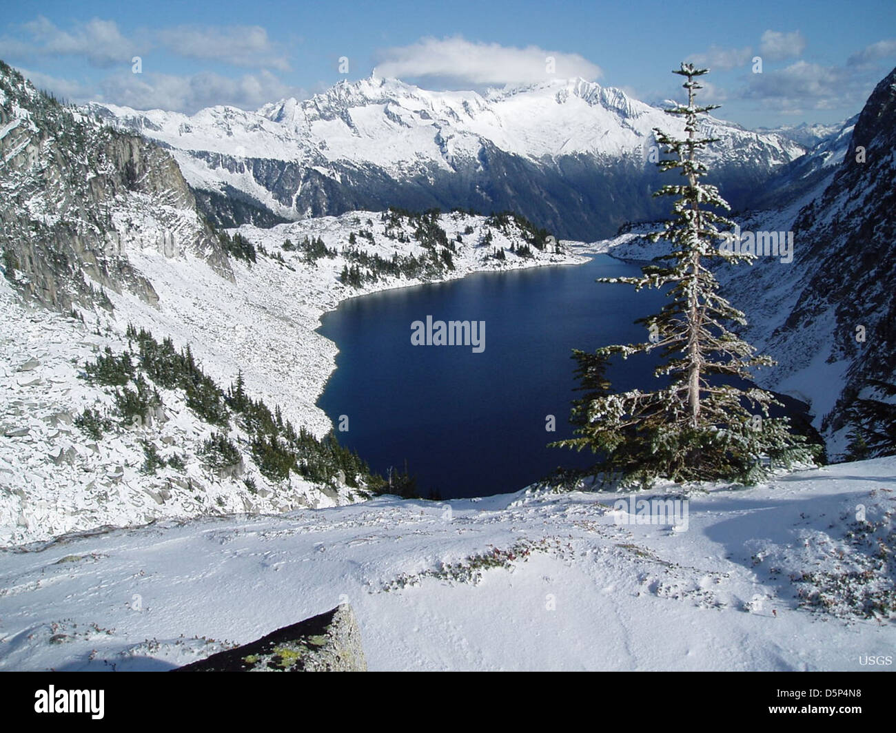 alpine cascades lake landscape mountains national park nationalpark snow snow caps snowcaps Stock Photo