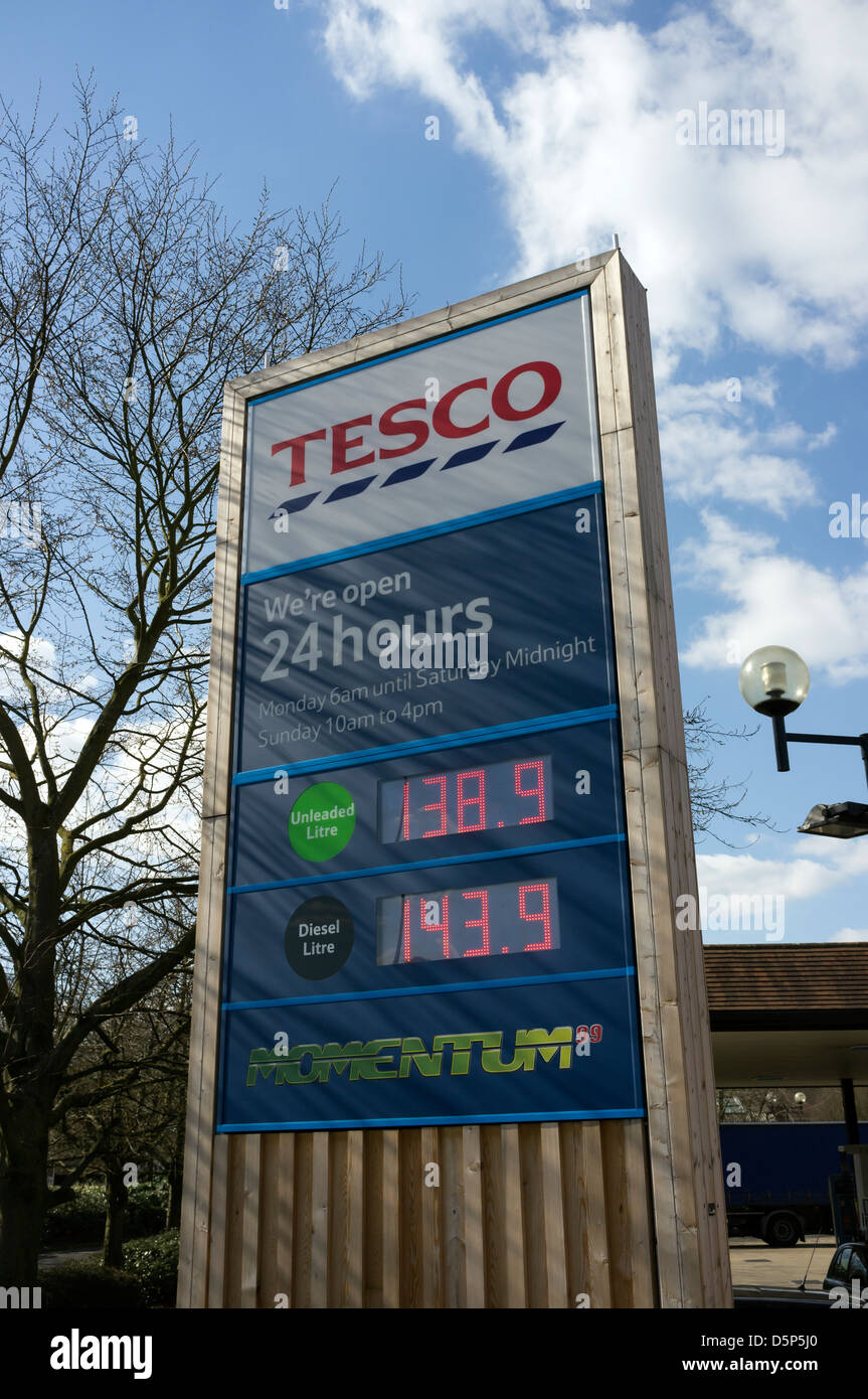 Illuminated petrol and diesel fuel prices Tesco Filling station Amersham Bucks UK Stock Photo