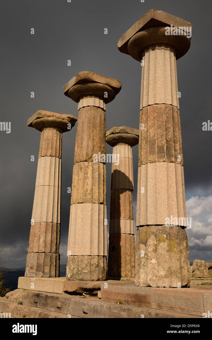 Four Doric columns at the acropolis ruins of the temple of Athena at Assos Behramkale Turkey Stock Photo