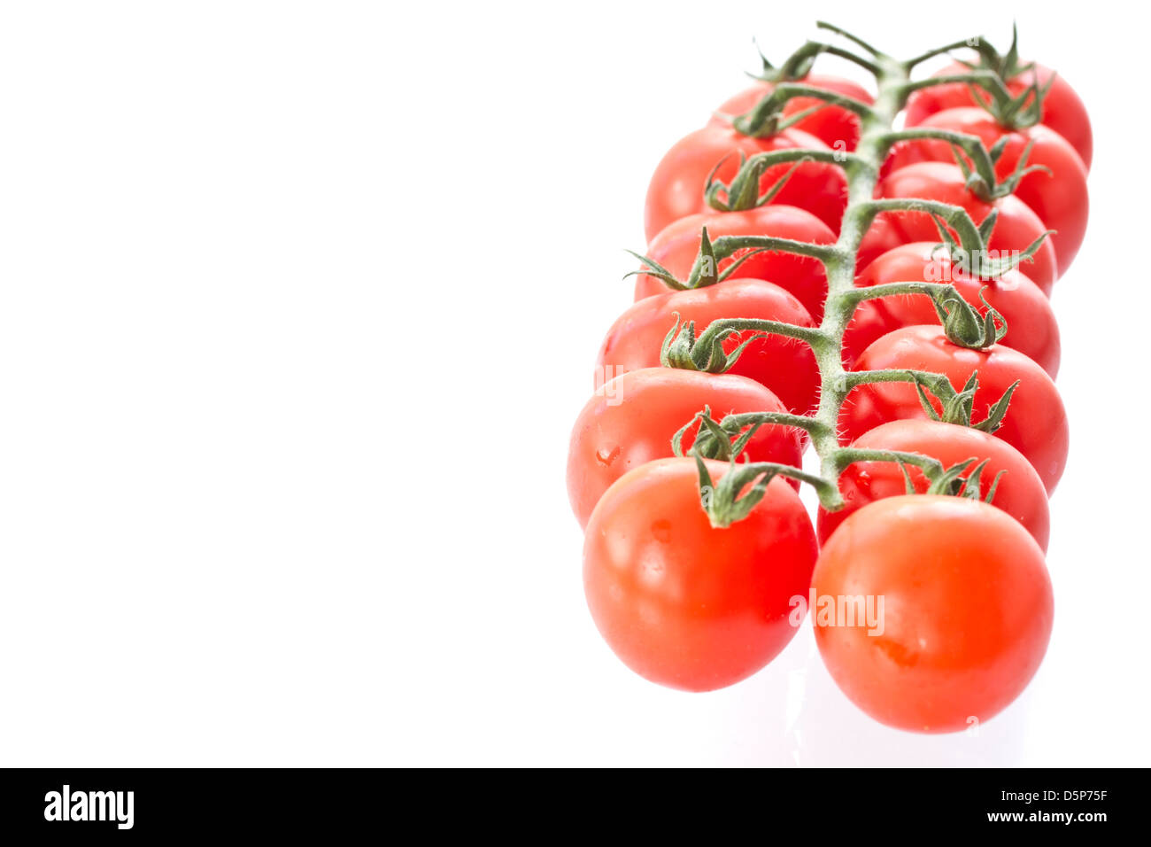 ripe red tomatoes isolated on white background Stock Photo - Alamy
