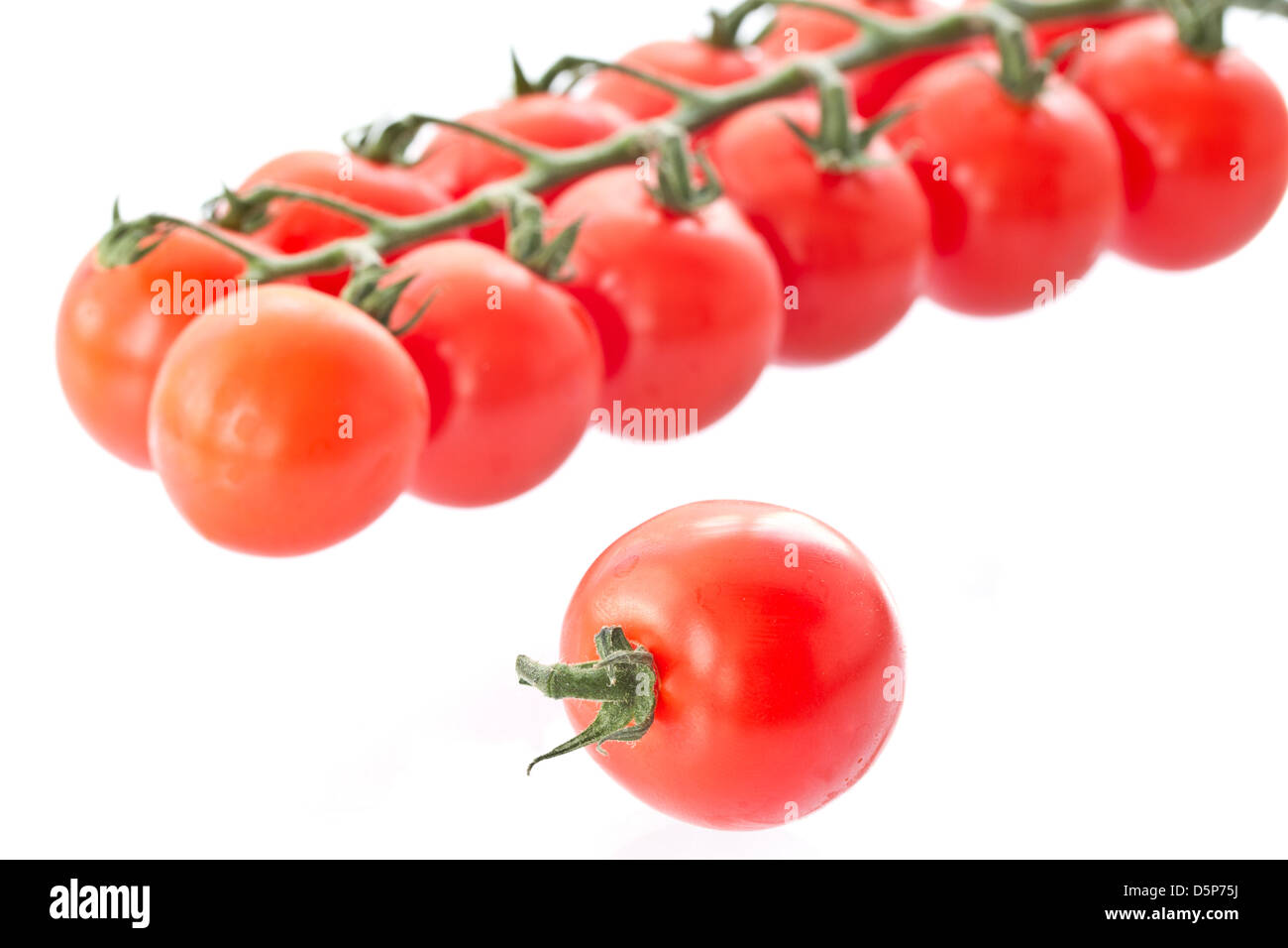ripe red tomatoes isolated on white background Stock Photo - Alamy