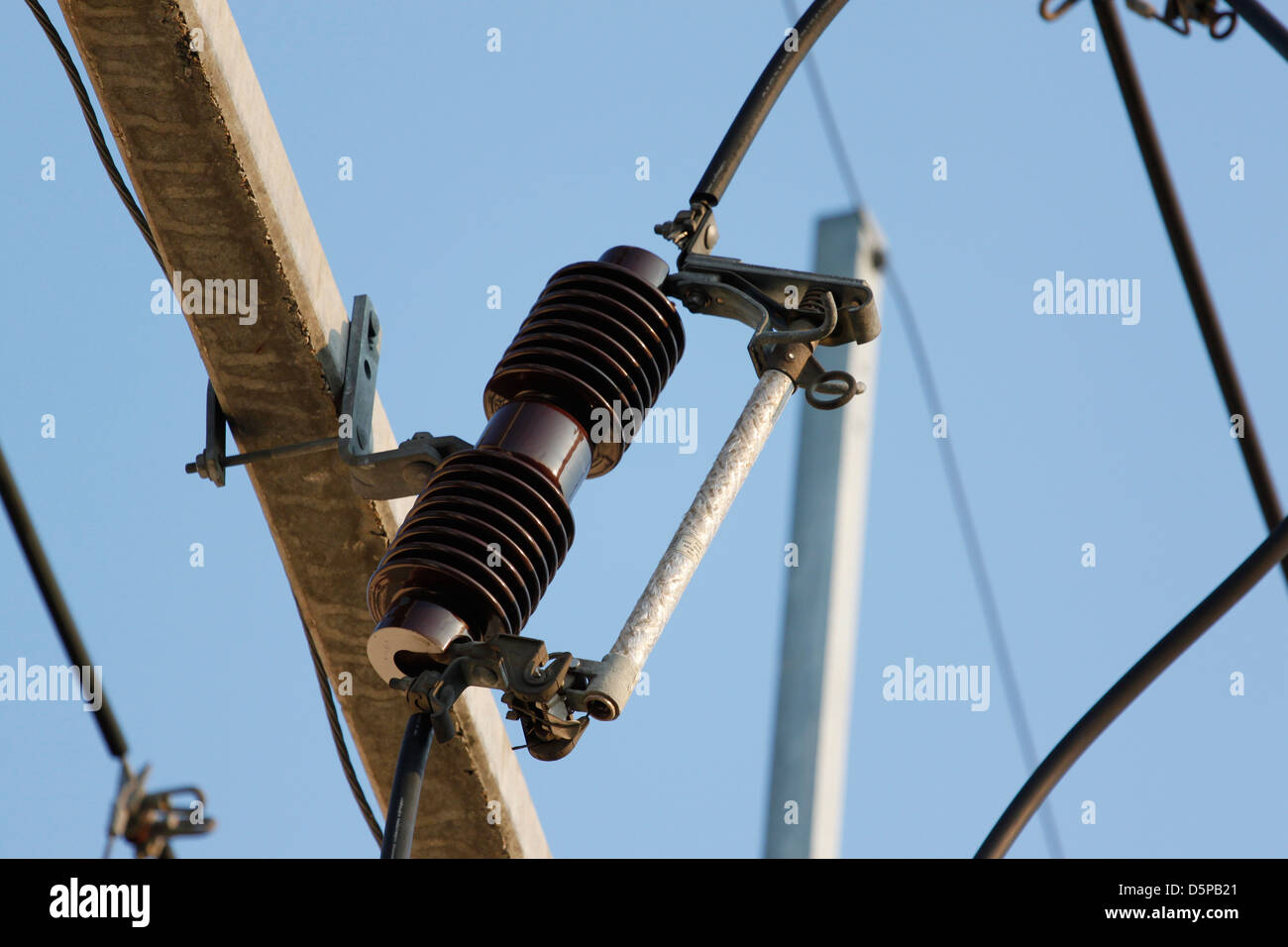 Cable the High voltage power on the pylons. Stock Photo