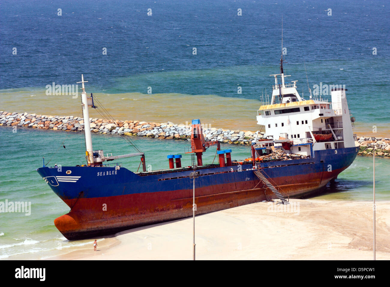 Coastal Freighter run aground on the Beach in Ajman, United Arab Emirates Stock Photo