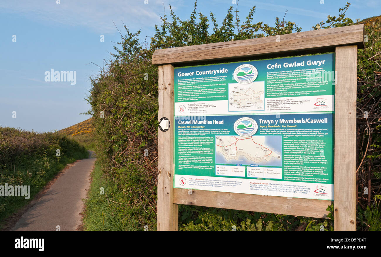 Wales, Gower Peninsula, The Mumbles, coastal footpath, bilingual sign in english and welsh Stock Photo