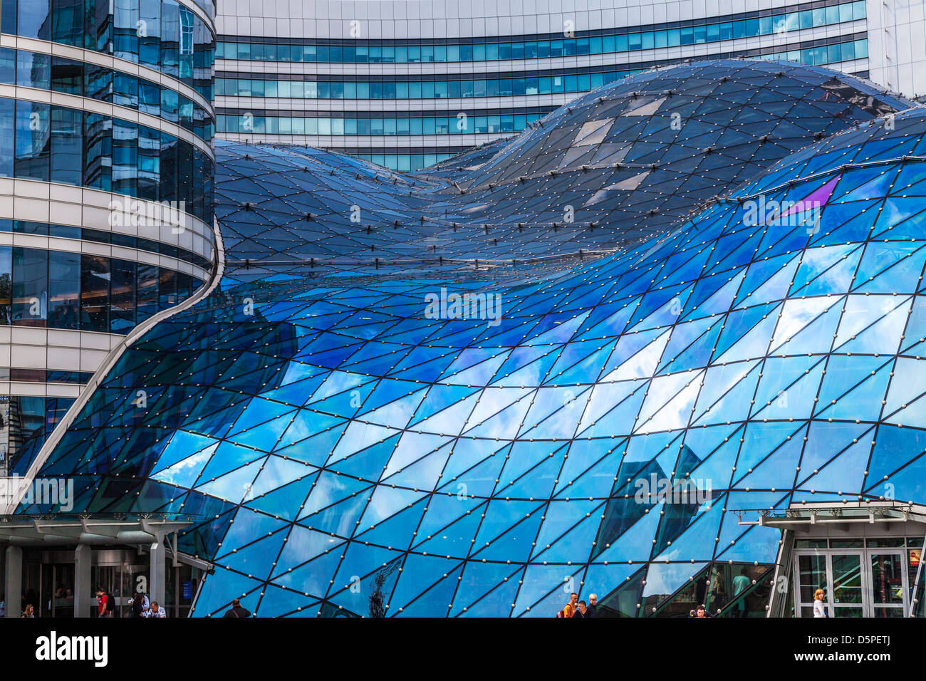 The futuristic glass roof of the Złote Tarasy (Golden Terraces) shopping  mall in central Warsaw, Poland Stock Photo - Alamy