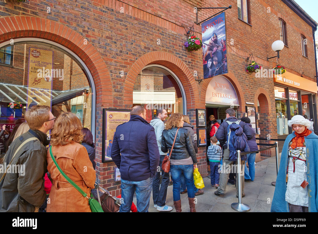 Queue outside the Jorvik Viking Centre, Coppergate  York Yorkshire UK Stock Photo
