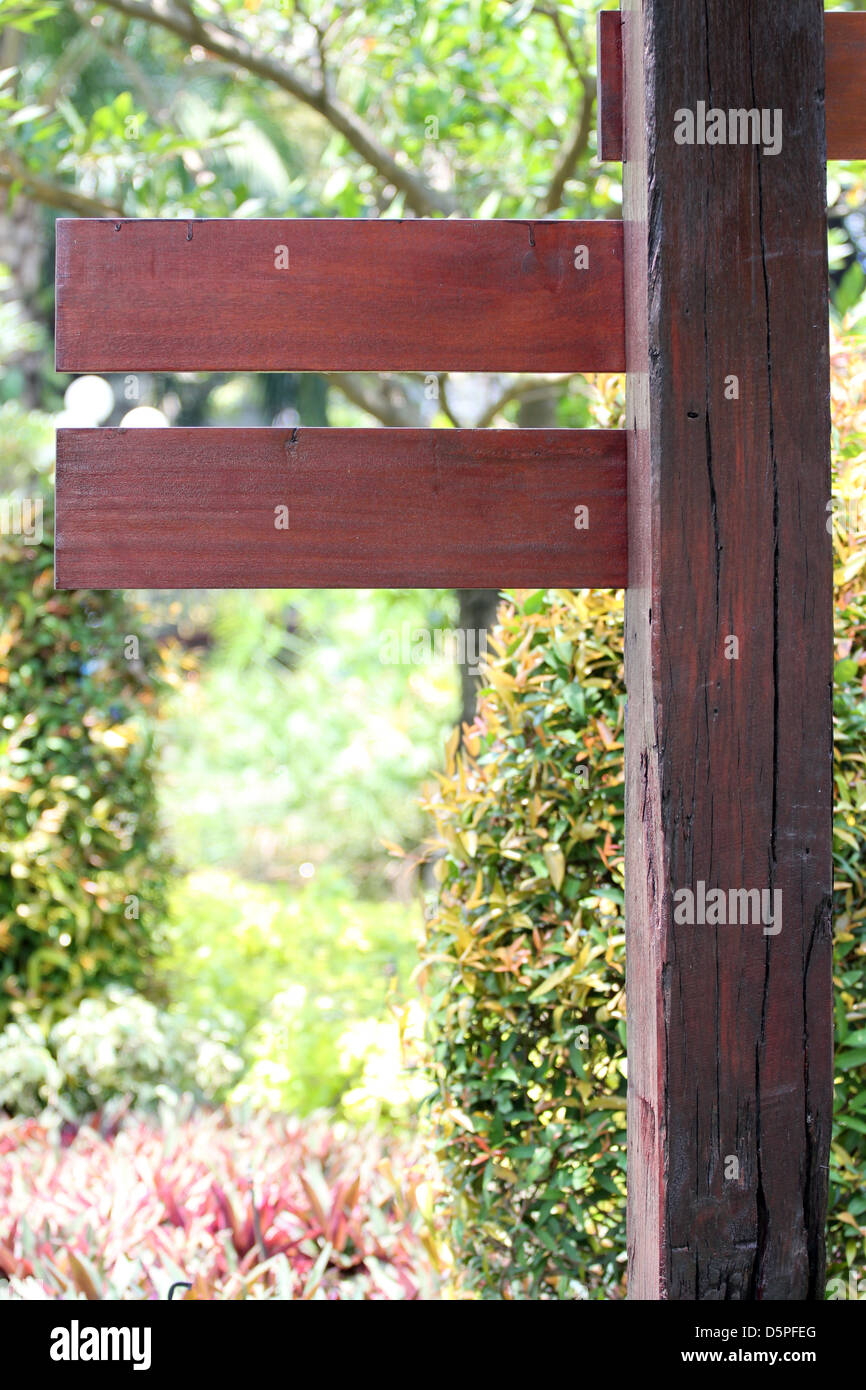 Wooden labels in a park,The wooden on Brown Color. Stock Photo