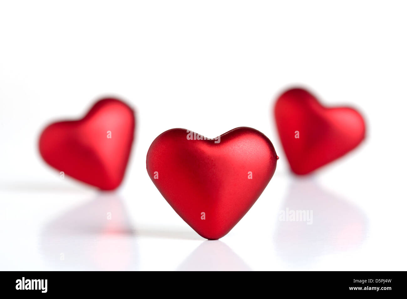 Red valentine hearts isolated on white Stock Photo - Alamy