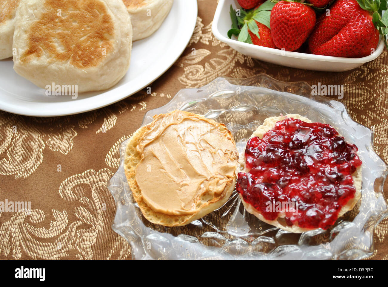 Peanut and Jelly English Muffin with Strawberries Stock Photo