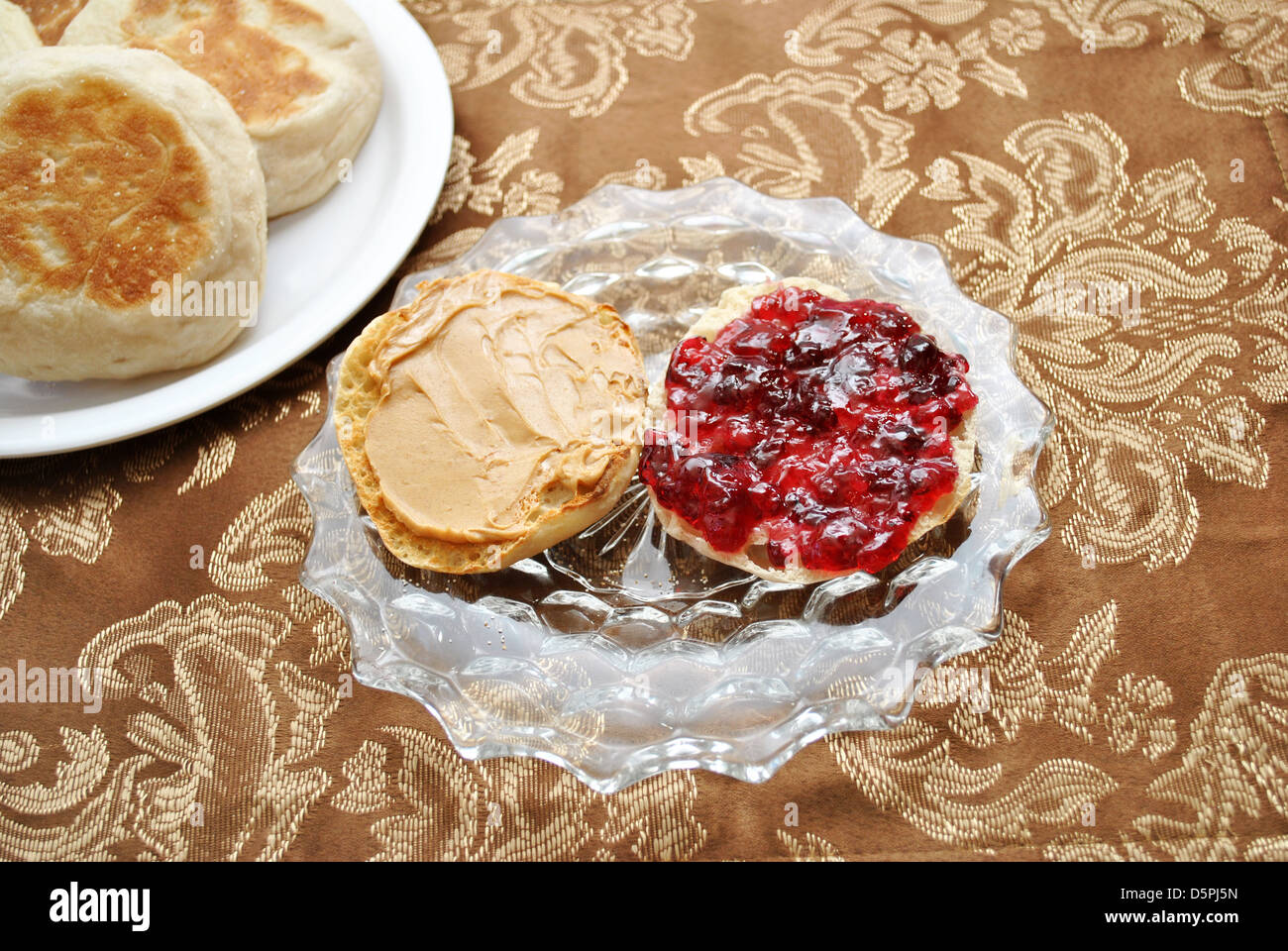 A Served Peanut Butter And Jelly English Muffin For Breakfast