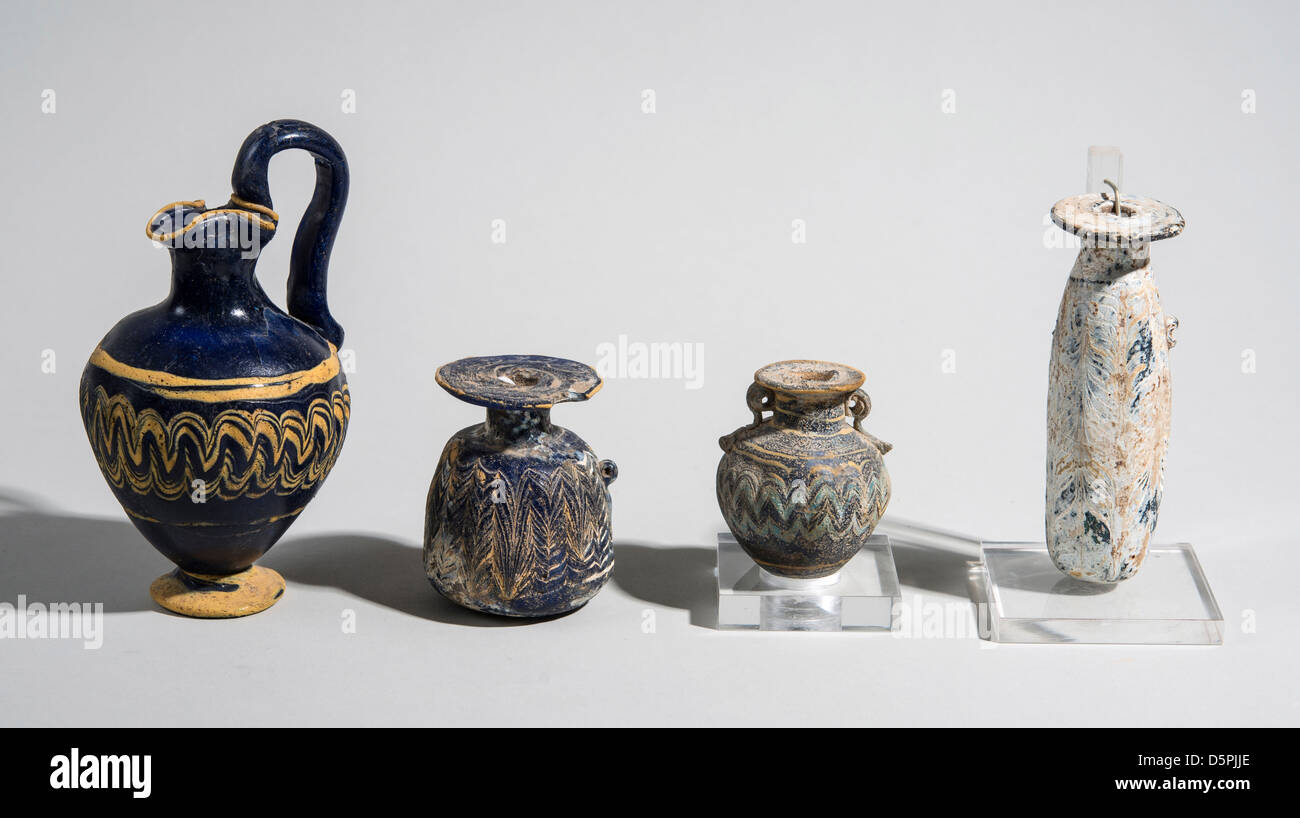 Core-formed Glass vessels 4-5th century BCE From left to right Oinochoe, Alabastron, Aryballos and Alabstron Stock Photo