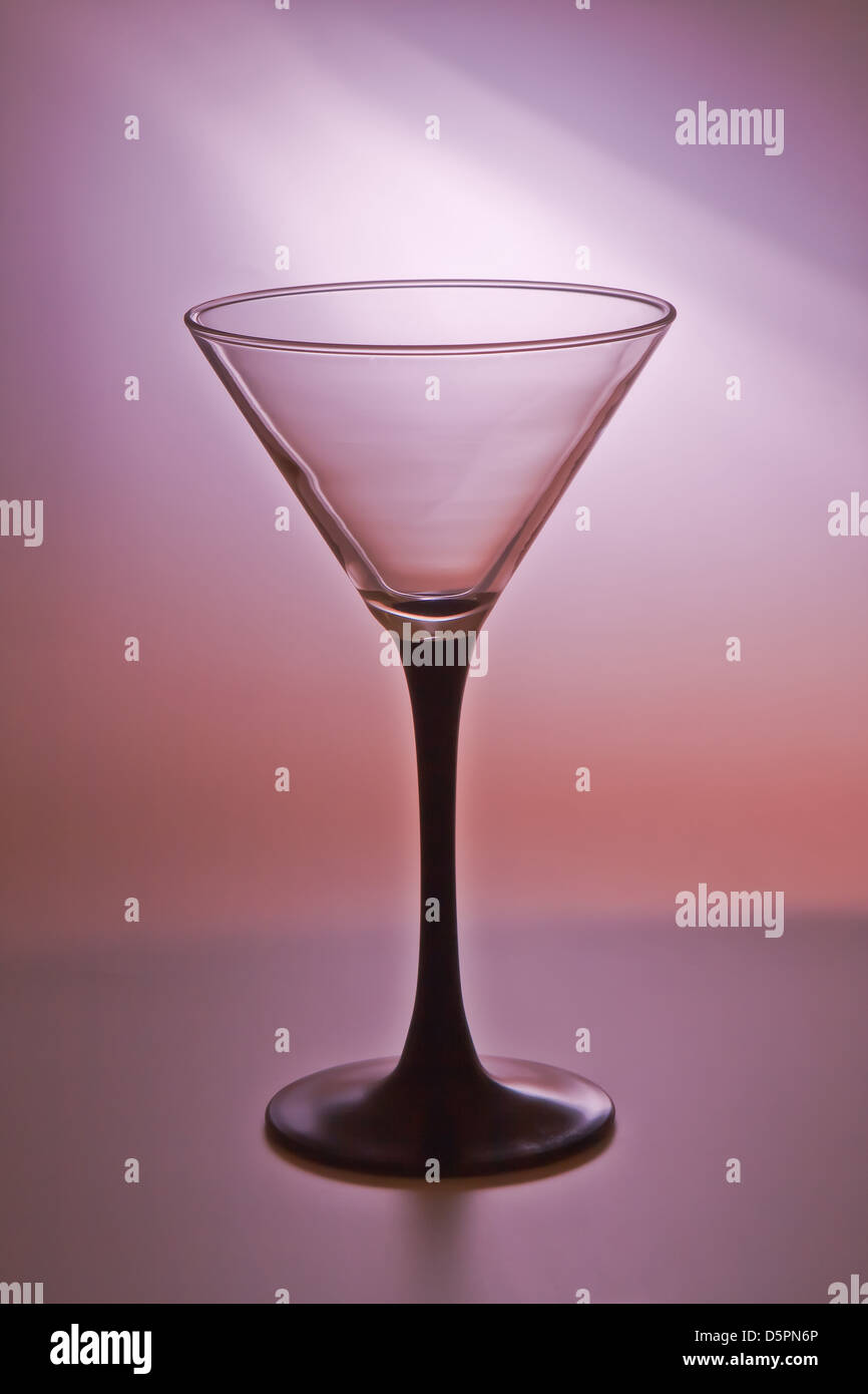 Elegant wineglass on color gradient background Stock Photo