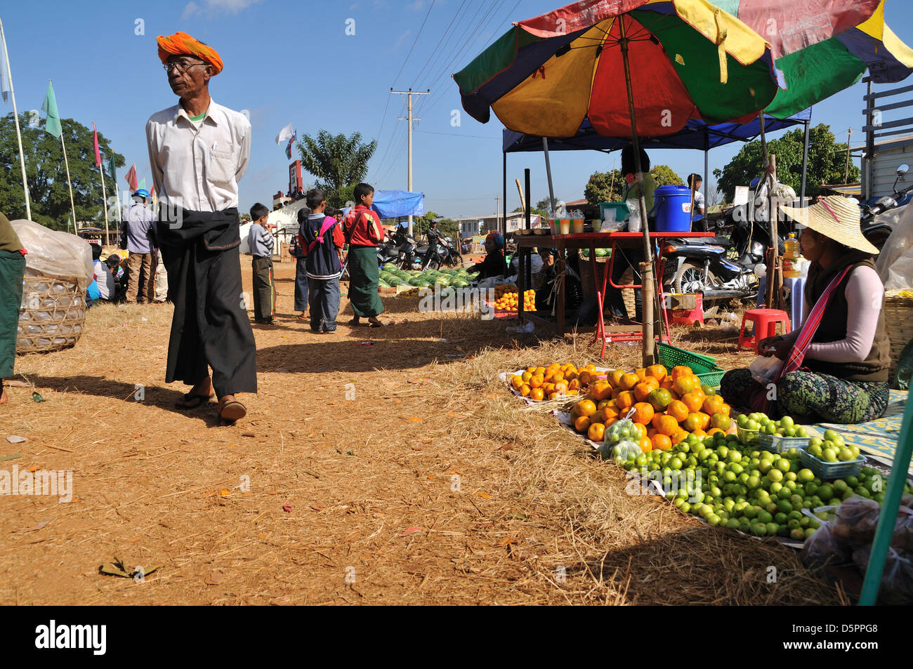 Pa-O Man walking in Market near Kakku, Taunggyi, Shan State, Myanmar, Southeast Asia Stock Photo