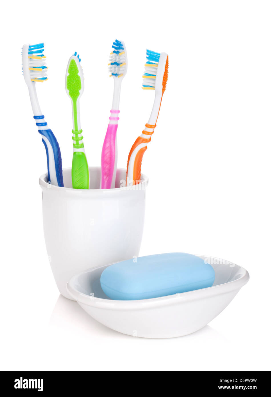Four colorful toothbrushes and soap. Isolated on white background Stock ...