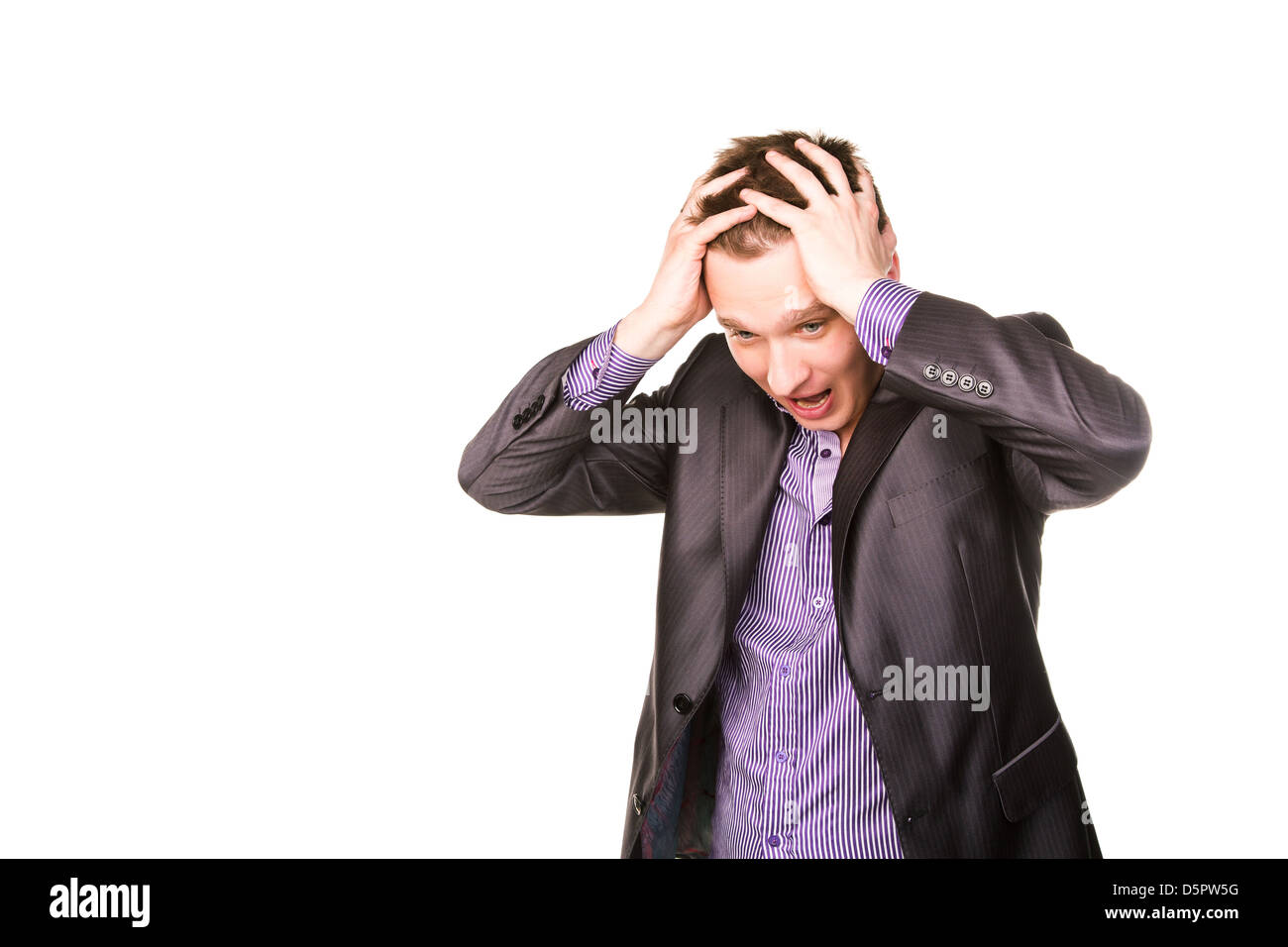 Expressive young businessman frustated thinking isolated on white Stock Photo