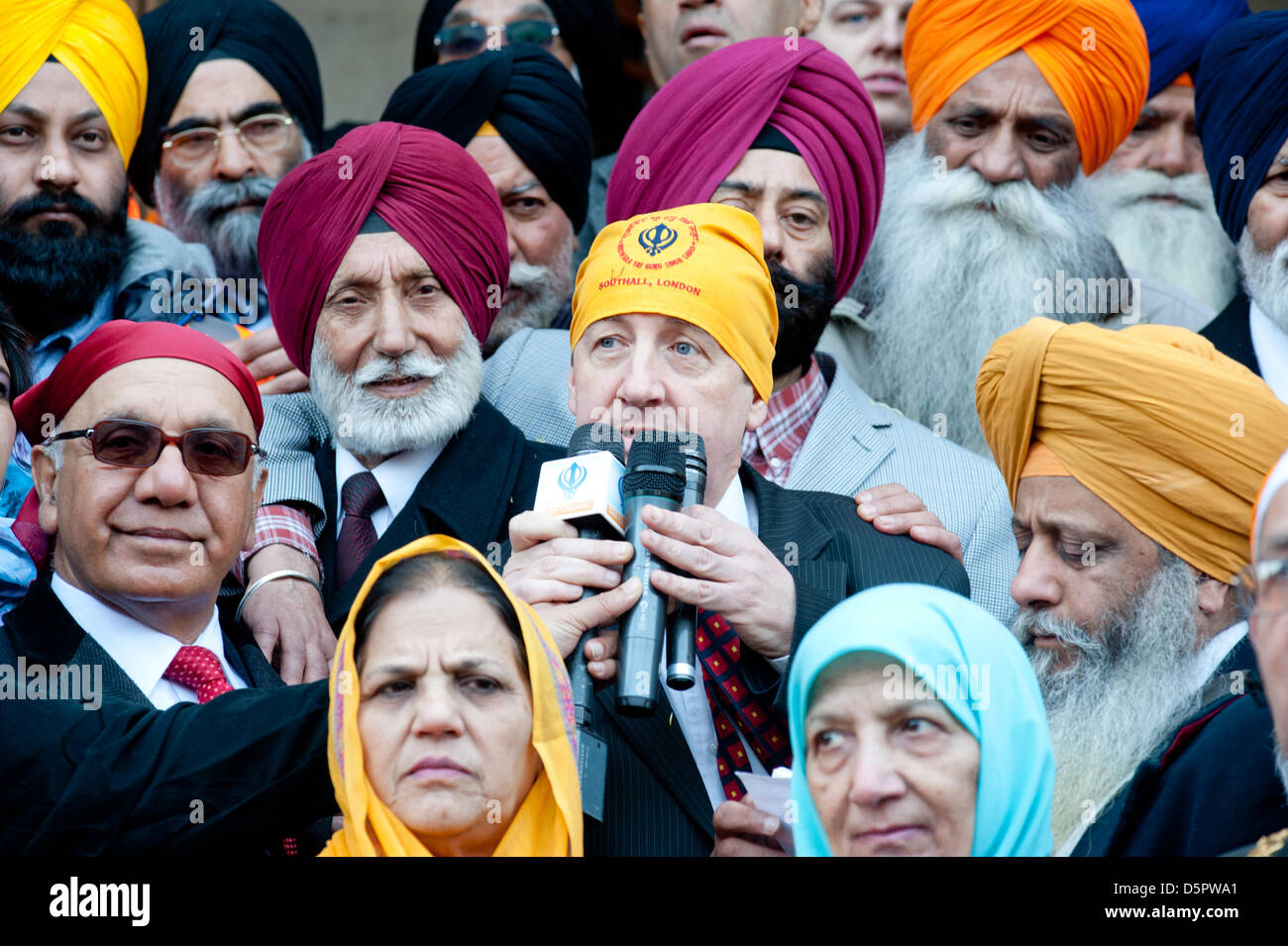 London, UK. 7th April 2013. a member of the Ealing council joins the Sikh community for the Nagar Kirtan celebrations in Southall, London. Credit: Piero Cruciatti/Alamy Live News Stock Photo