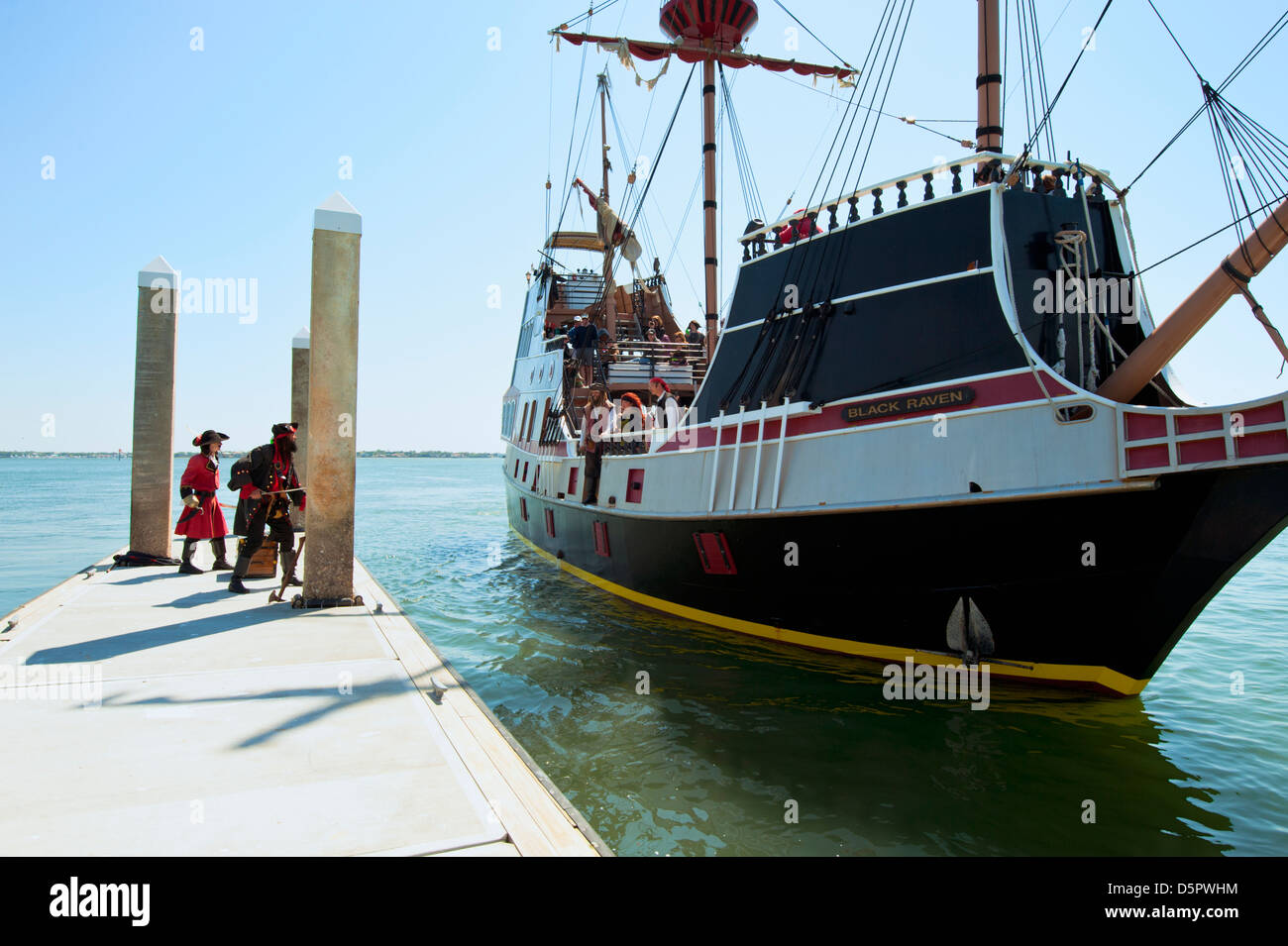 A pirate ship with pirates, 'The Black Raven' sailing near the Vilano Beach Floating Pier in St. Augustine Florida Stock Photo
