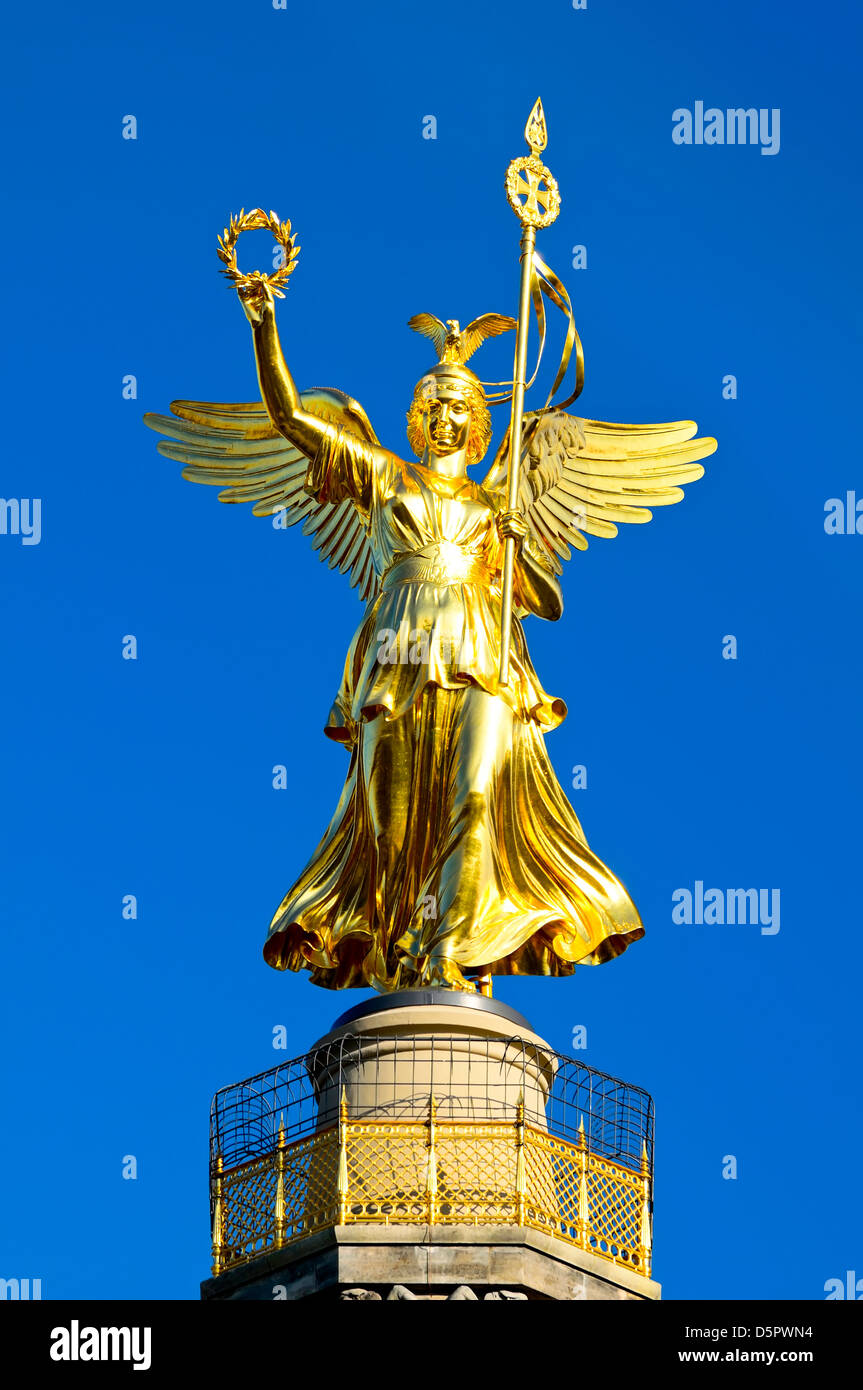 golden angel statue on victory column berlin, germany Stock Photo