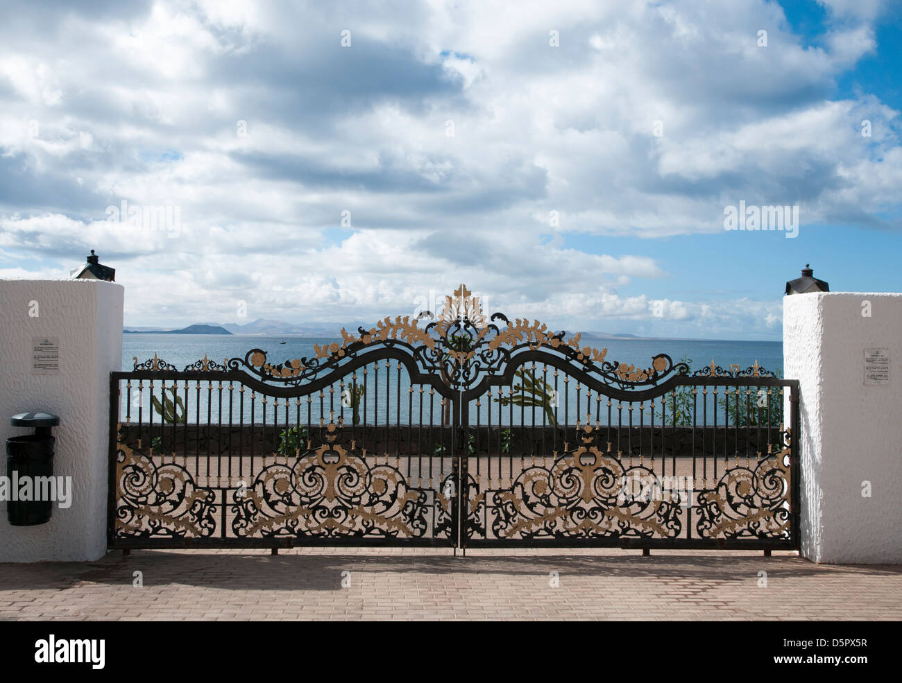 iron gate design with peculiar shapes black and gold color Stock Photo