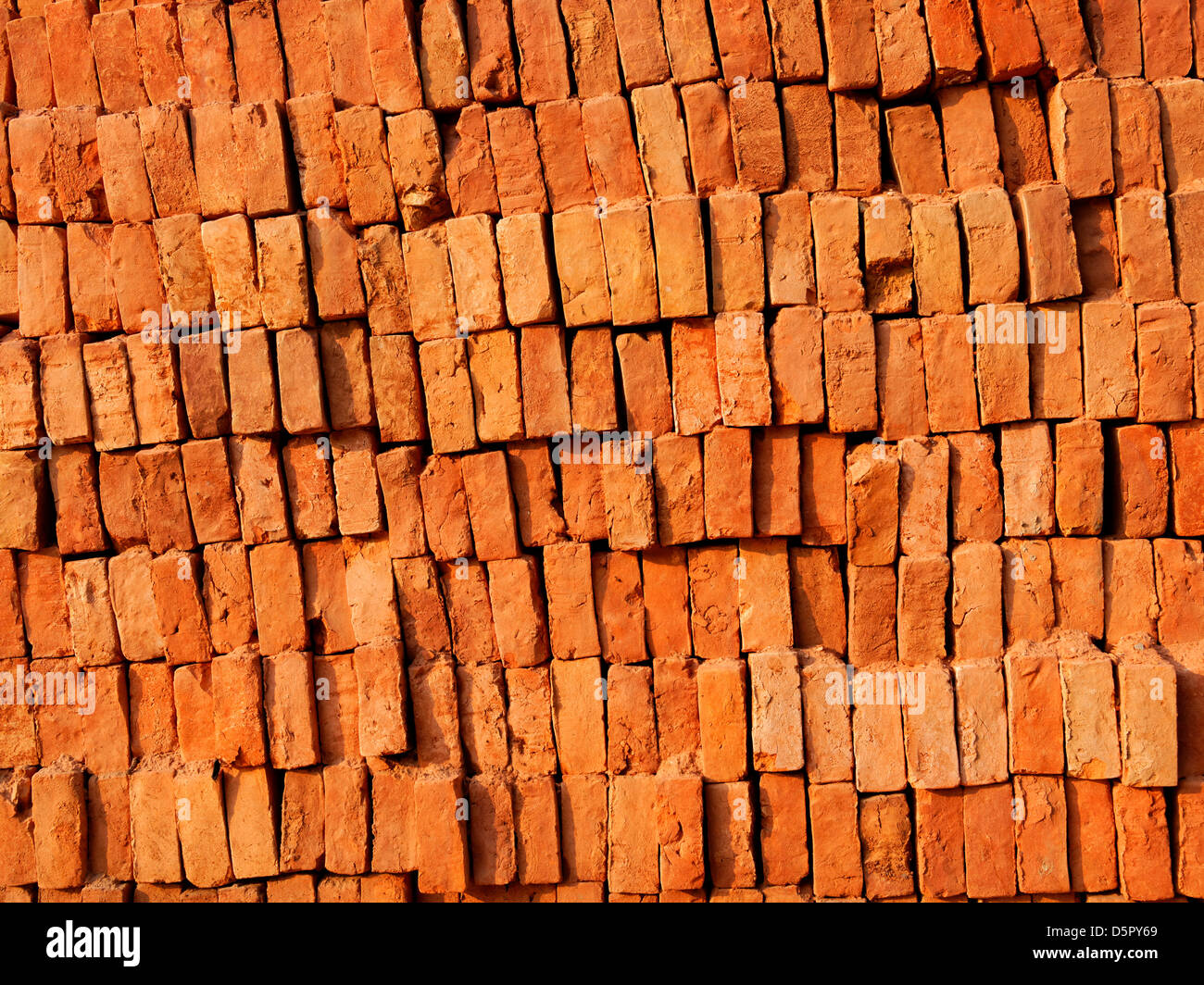Brick stack, construction material background Stock Photo