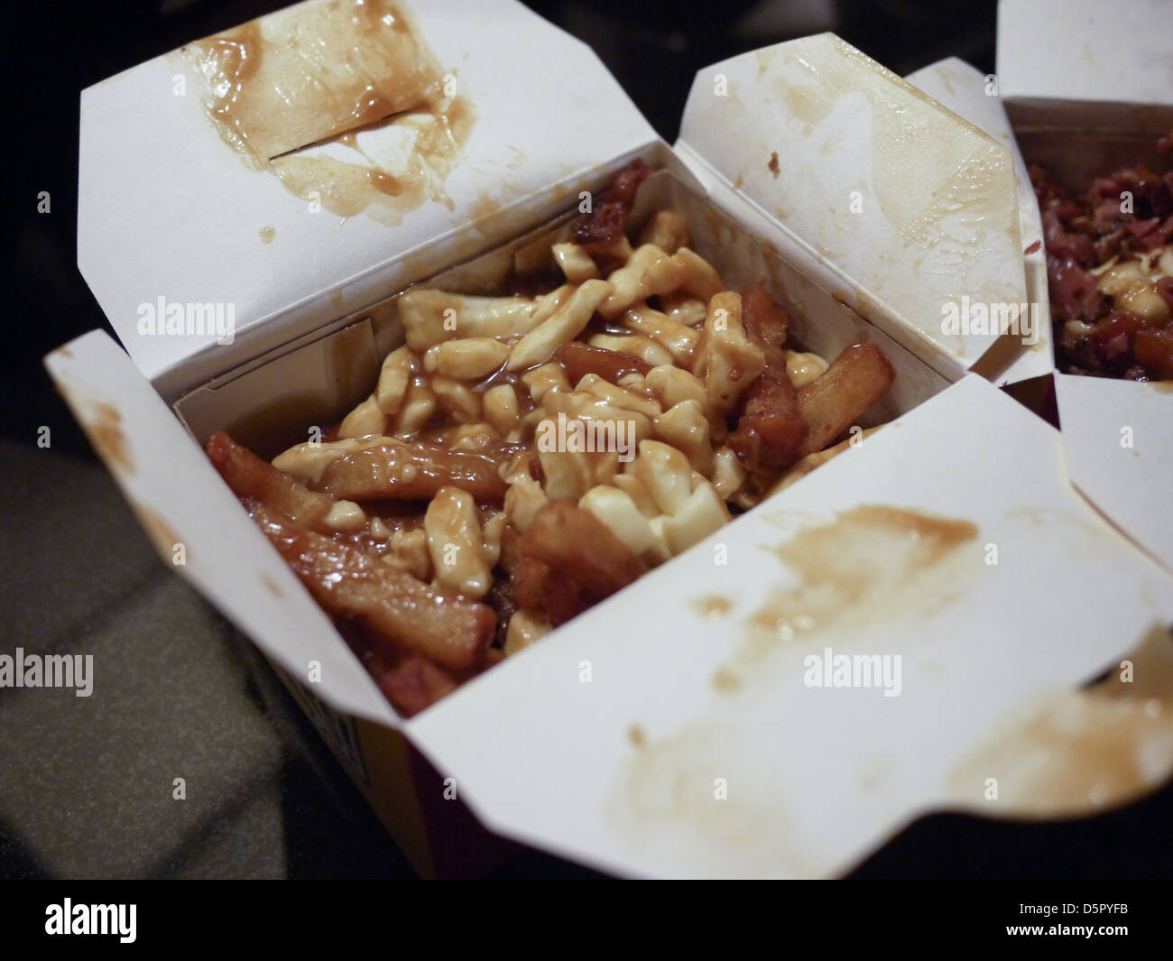 Poutine is a common Canadian dish, made with french fries, topped with