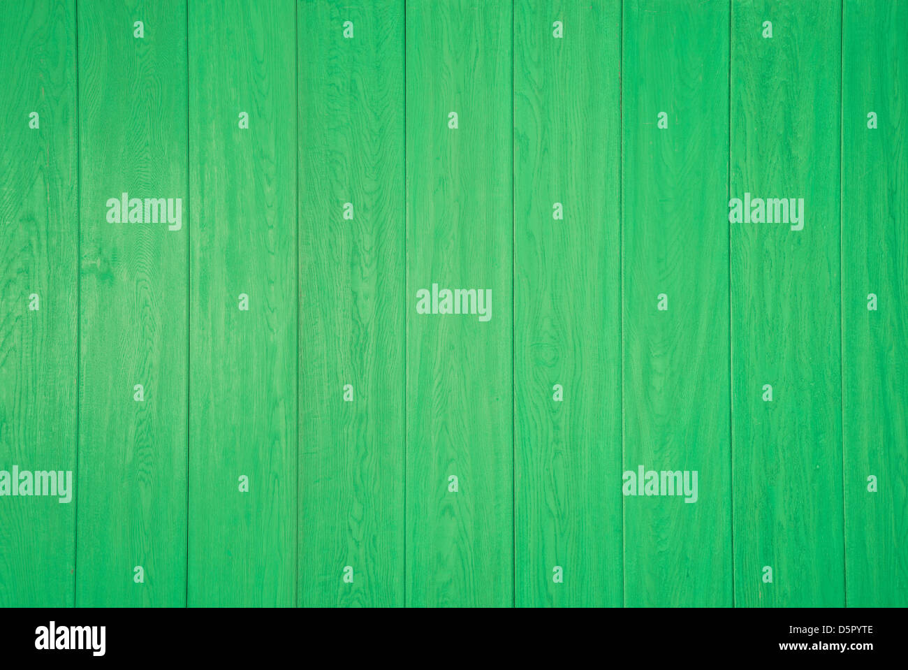 Wooden wall painted bright green Stock Photo