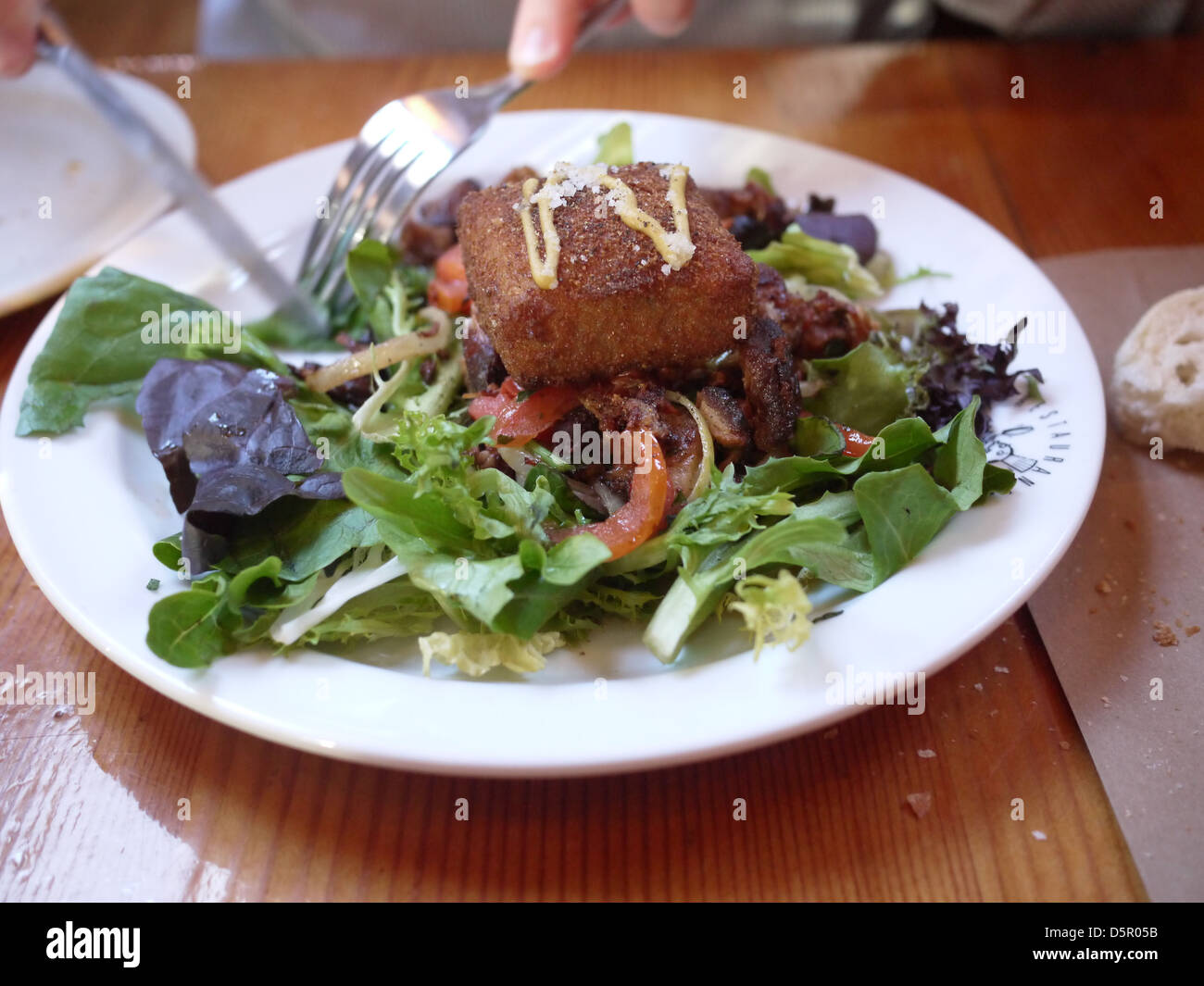 use knife fork eat salad Stock Photo