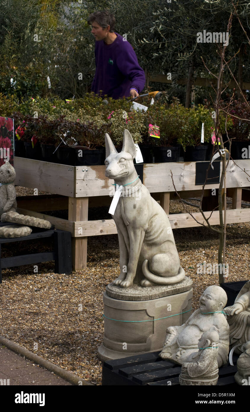 Dog ,stone garden statues,garden ornament. Stock Photo