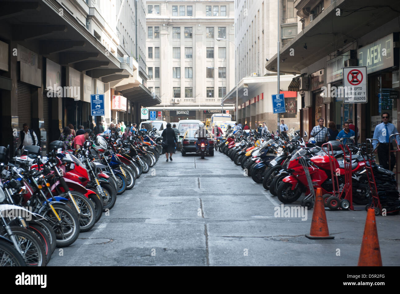 Motorbikes lined and parked in city in Santiago Chile Stock Photo