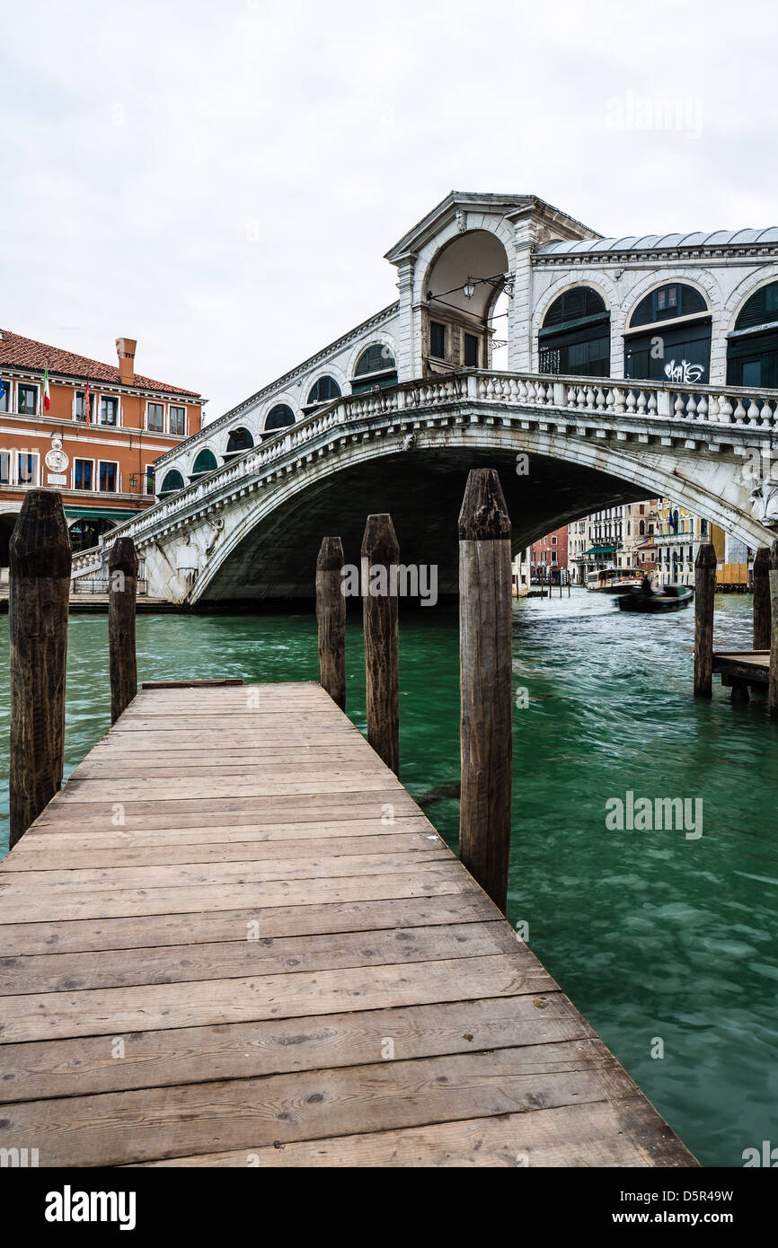 Rialto Bridge (Ponte Di Rialto) in Venice. It's oldest and one of the four bridges spanning the Grand Canal in Venice, Italy Stock Photo