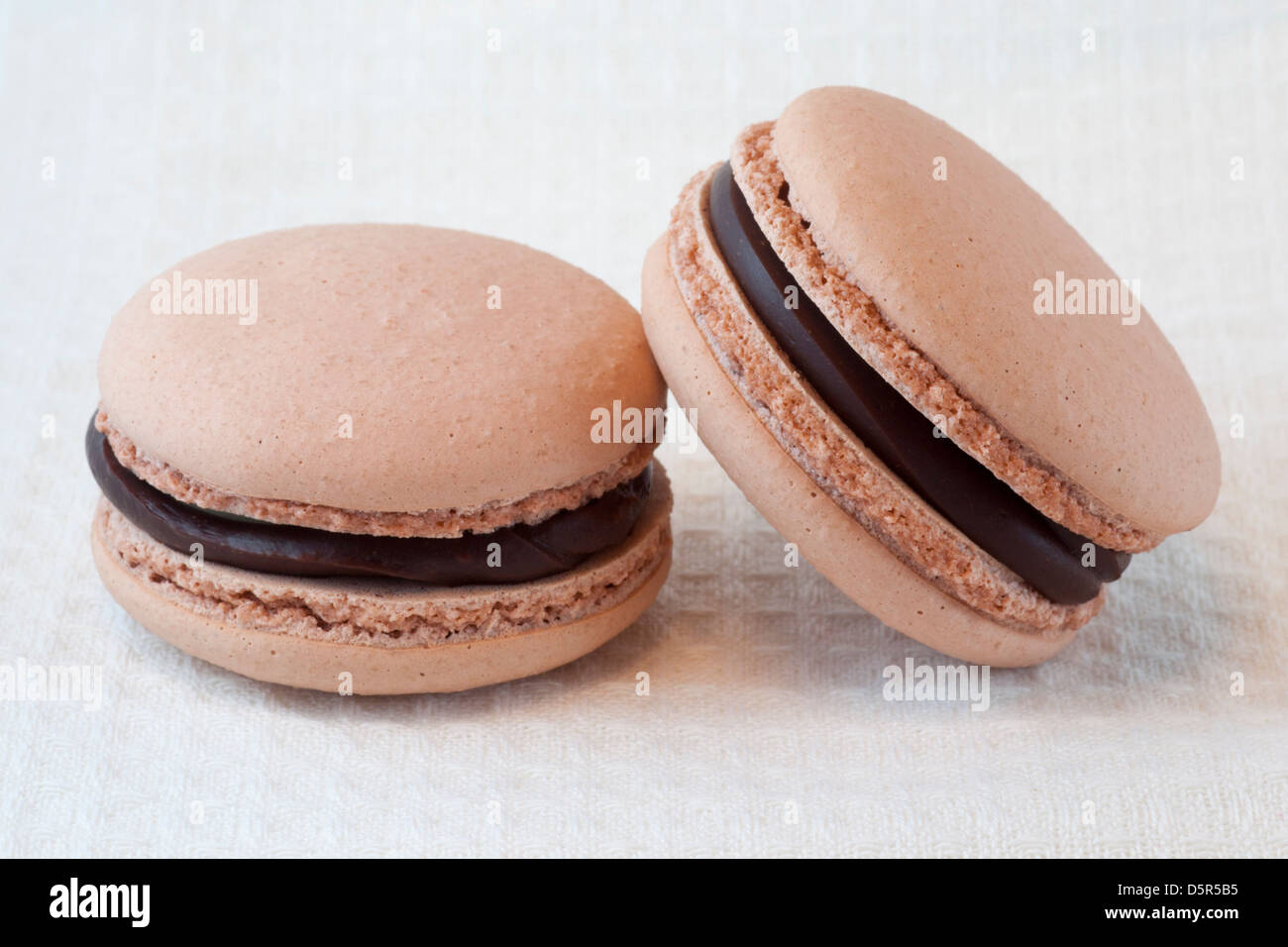 Peanut butter and chocolate flavoured macarons Stock Photo
