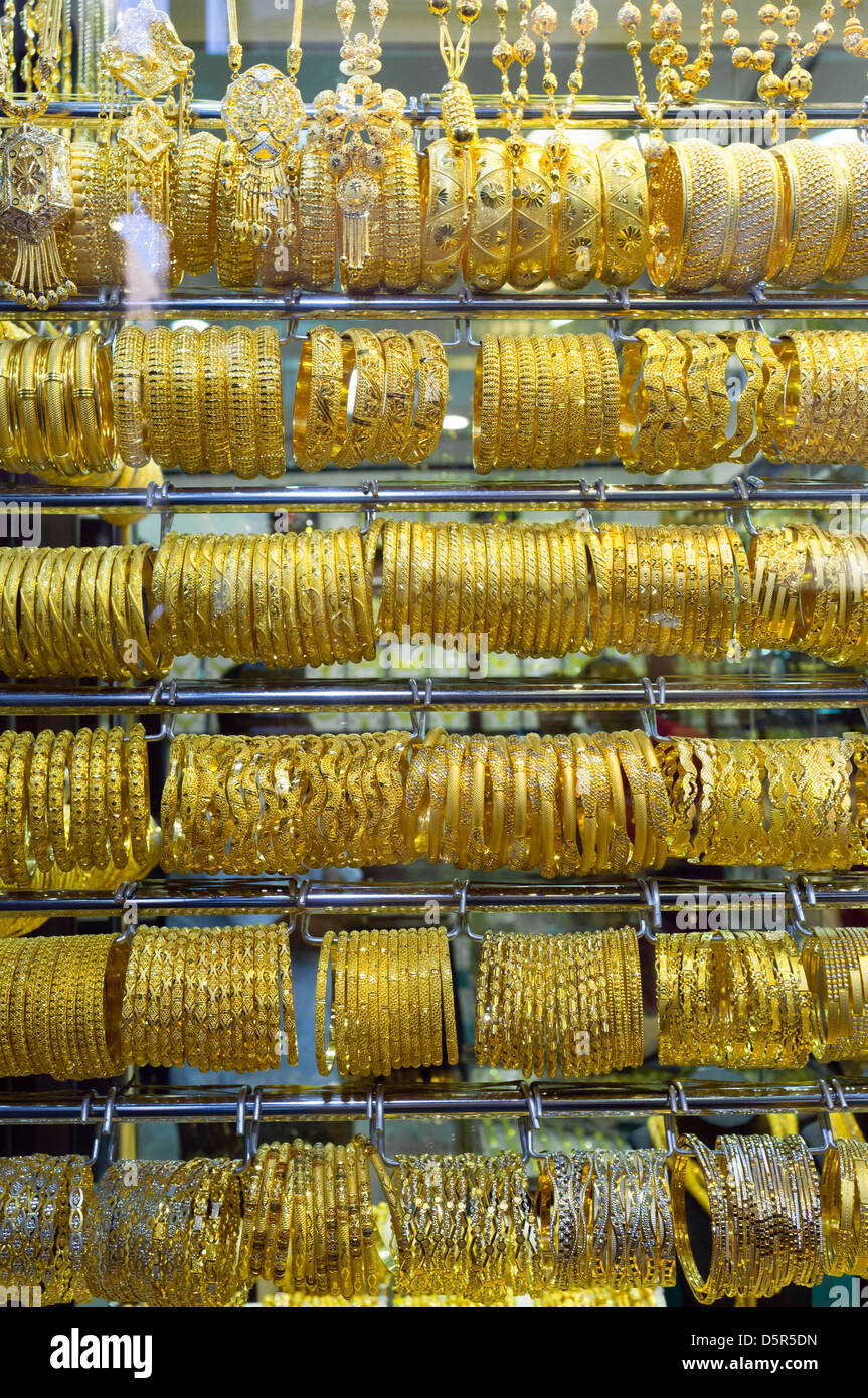 Window display of gold jewelery in Gold Souk in Deira Dubai United Arab Emirates Stock Photo