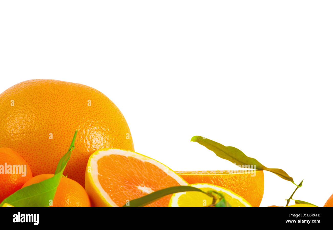 Vitamin c overload stacks of sliced fruit isolated on white stock