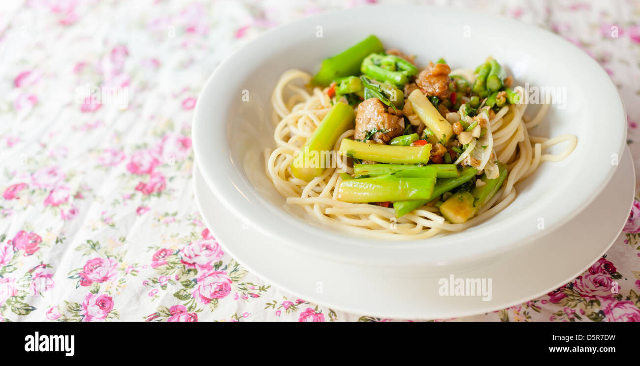 Spaghetti Fried with Kale and dried salted fish thai food Stock Photo