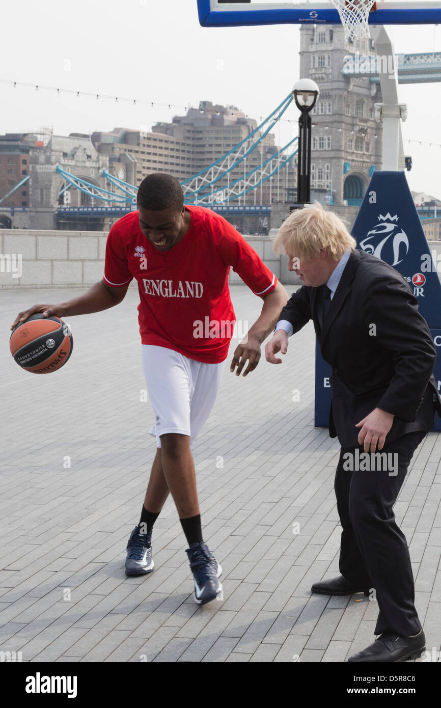 London, UK. 8th April 2013. Boris Johnson with Under-18 England Player  Kingsley Okoroh. London Mayor Boris Johnson promotes the 2013 Turkish  Airlines Euroleague Final Four Basketball event to be played at the