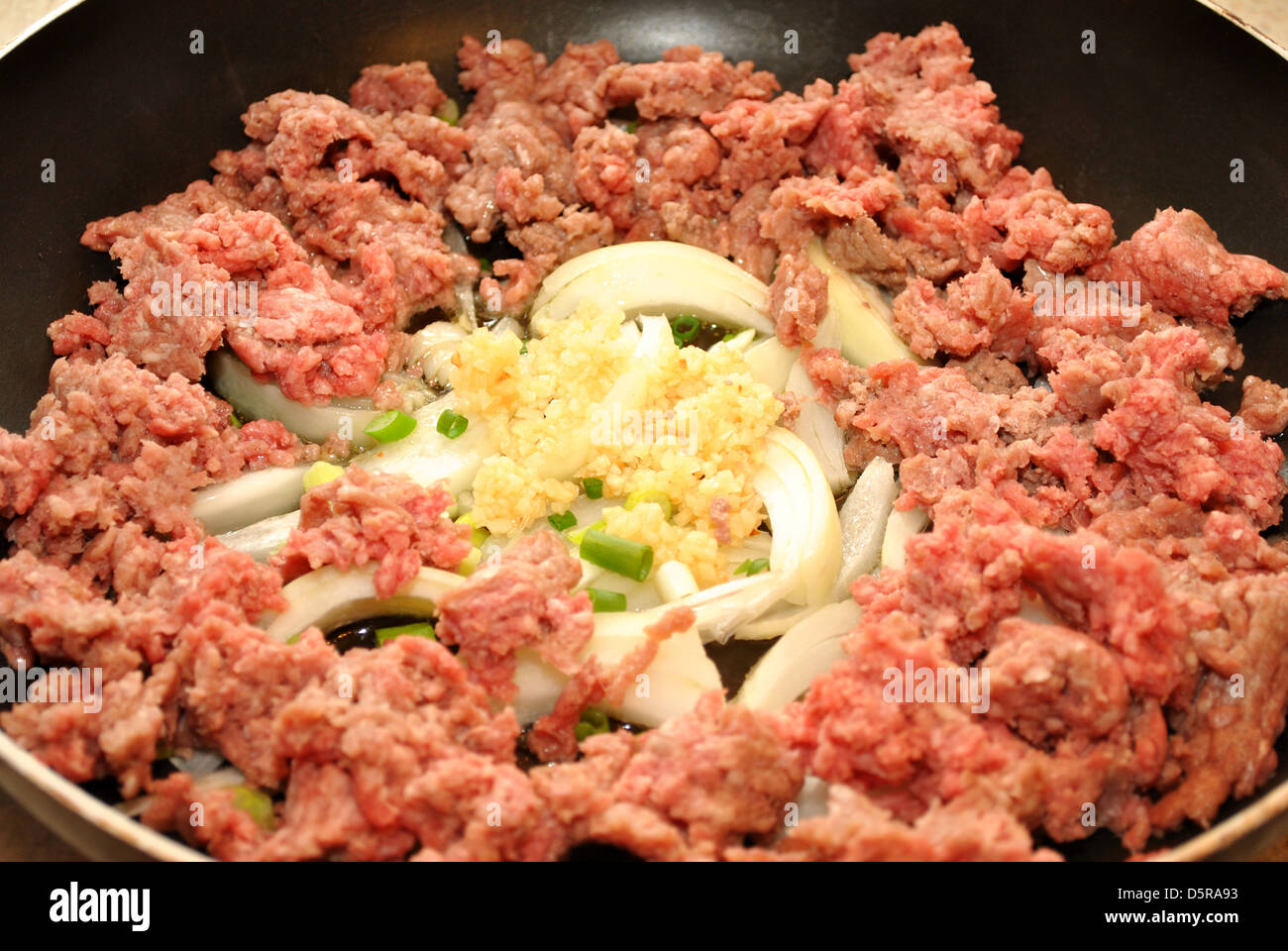 Ground Beef, Onions and Garlic Frying in a Pan Stock Photo Alamy