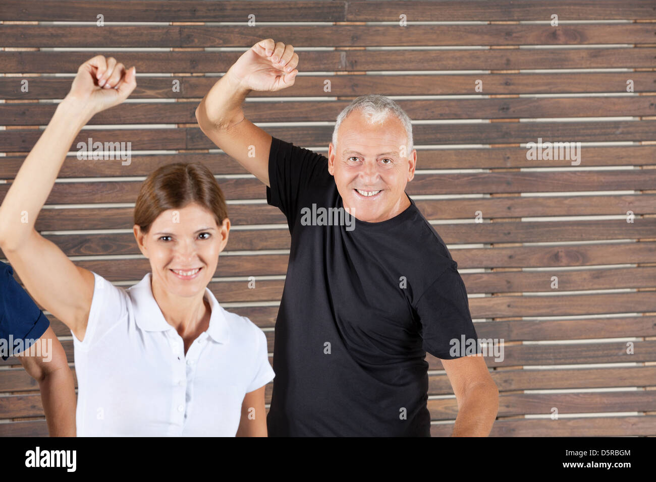 Senior people moving in dancing class in a group Stock Photo