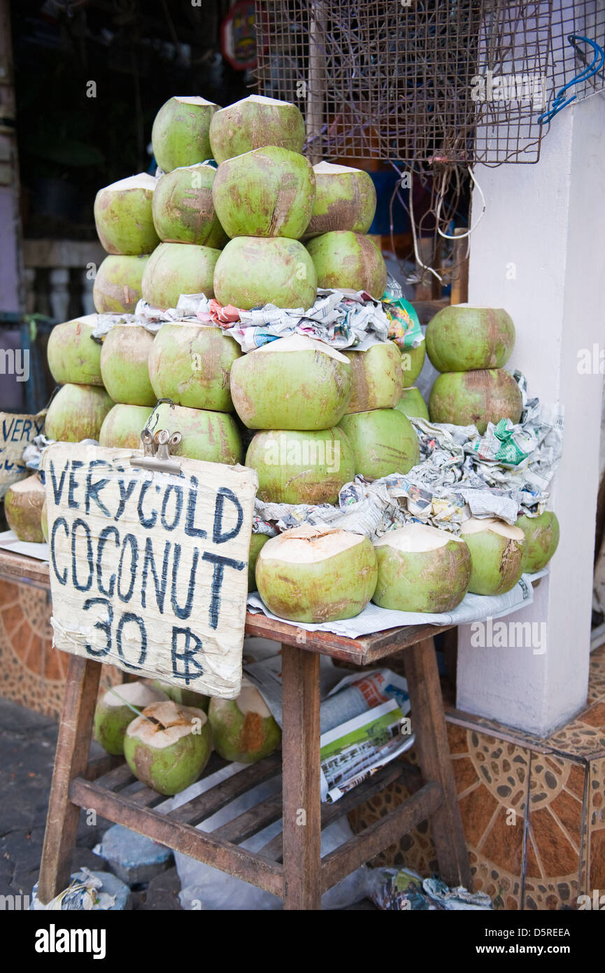 Green coconuts on sale Stock Photo Alamy