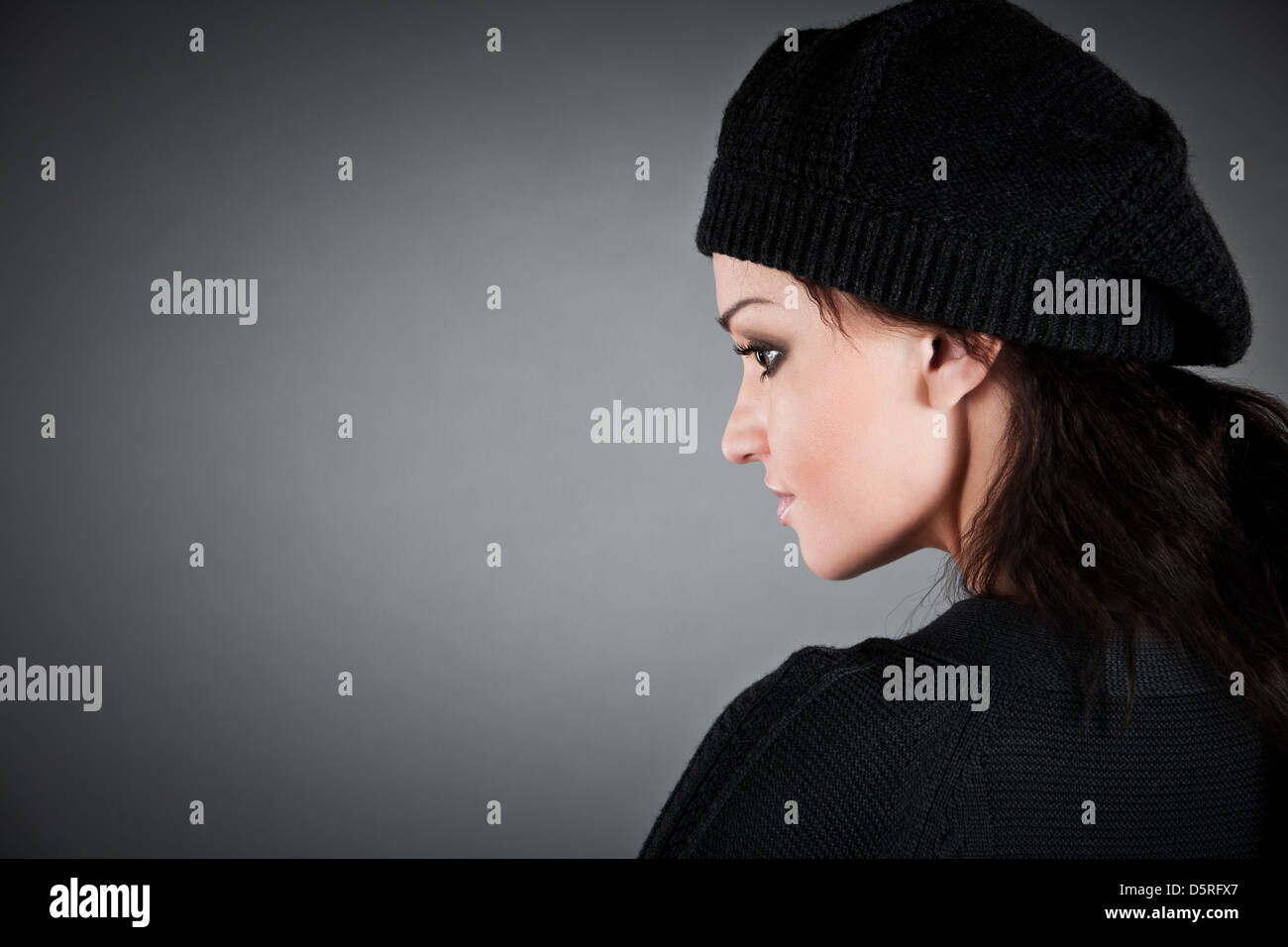 beautiful girl in a beret on the dark Stock Photo Alamy