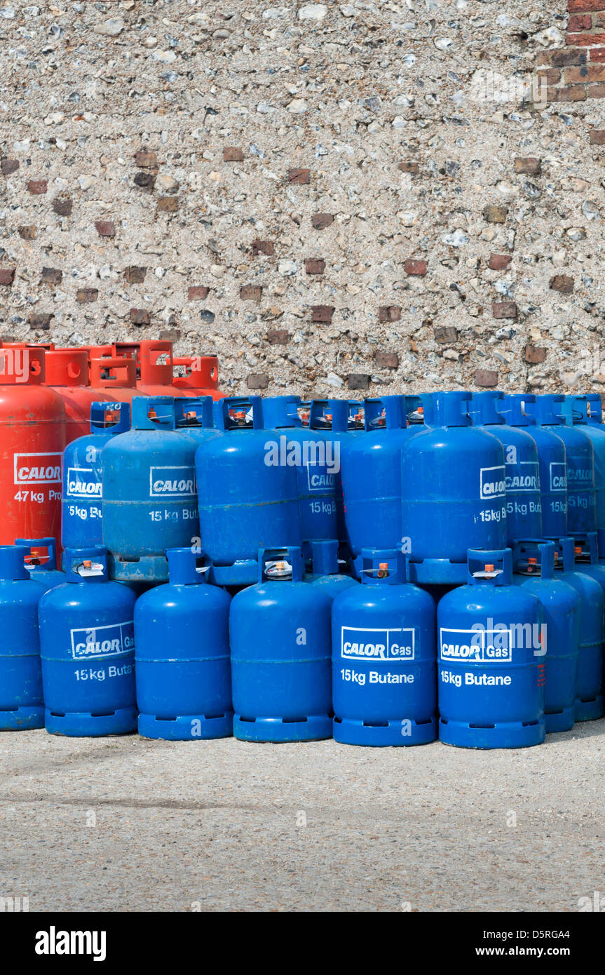 Stacked CALOR GAS butane bottles / cylinders / canisters Stock Photo