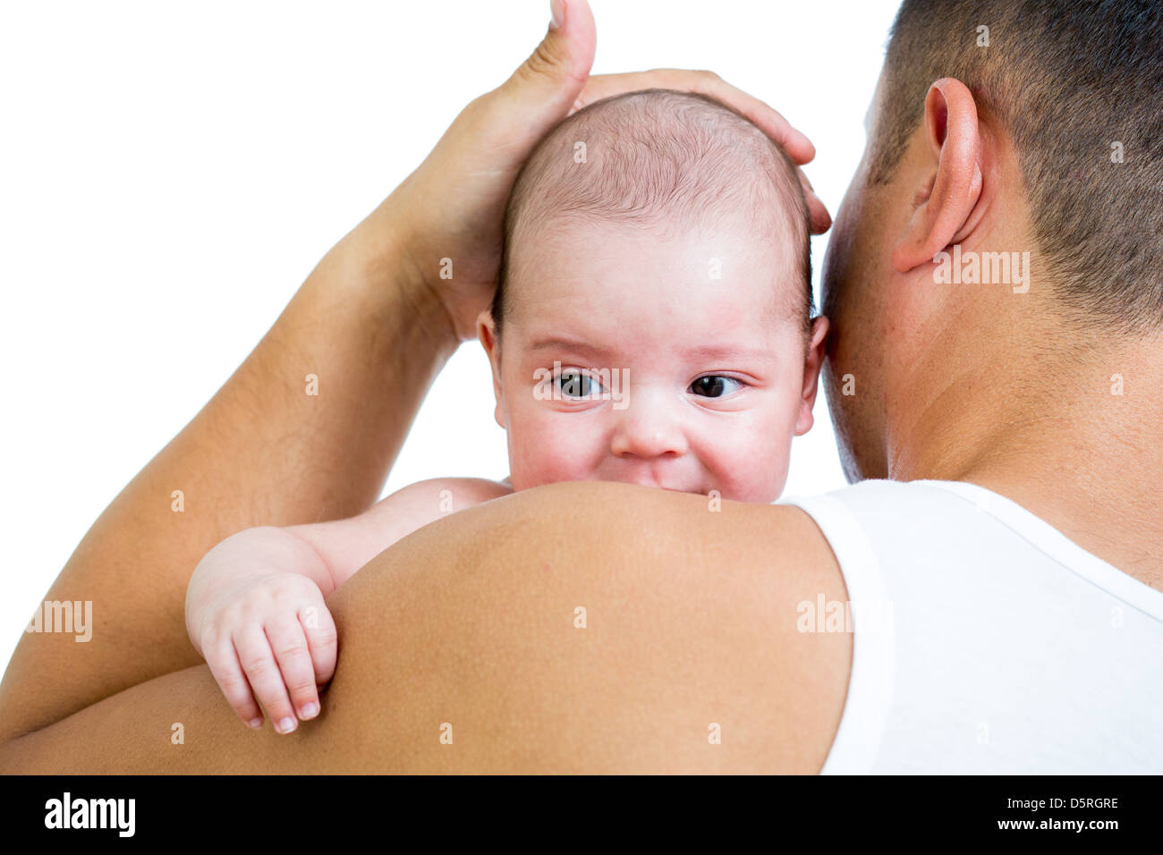 cute small baby on father's shoulder isolated on white background Stock Photo