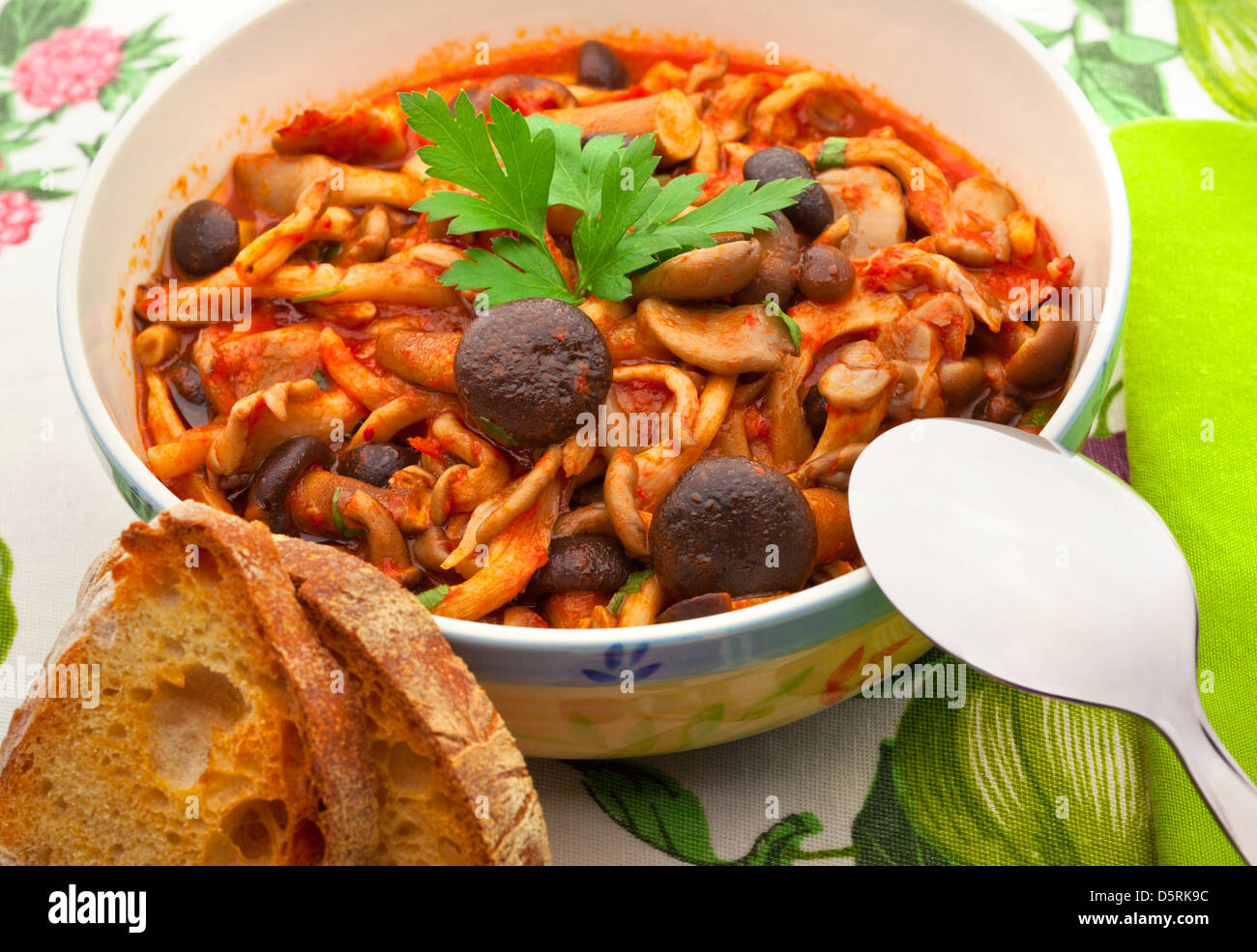 Porcini mushrooms with tomato Stock Photo