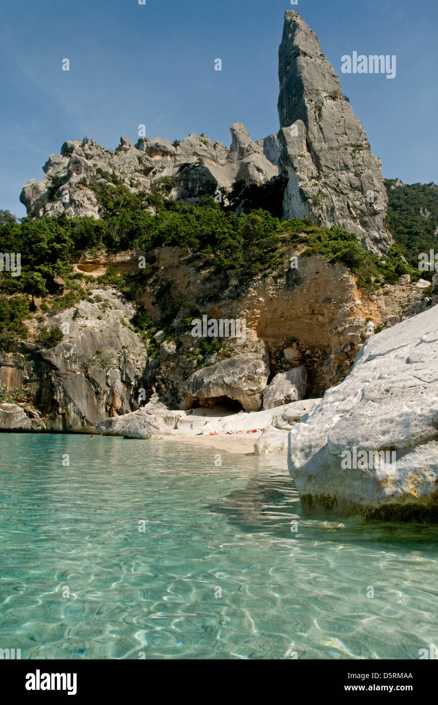 Transparent water and Aguglia/ Monte Caroddi mountain at Cala Goloritze beach, Baunei coast,Orosei gulf,Sardinia,Italy, Europe. Stock Photo