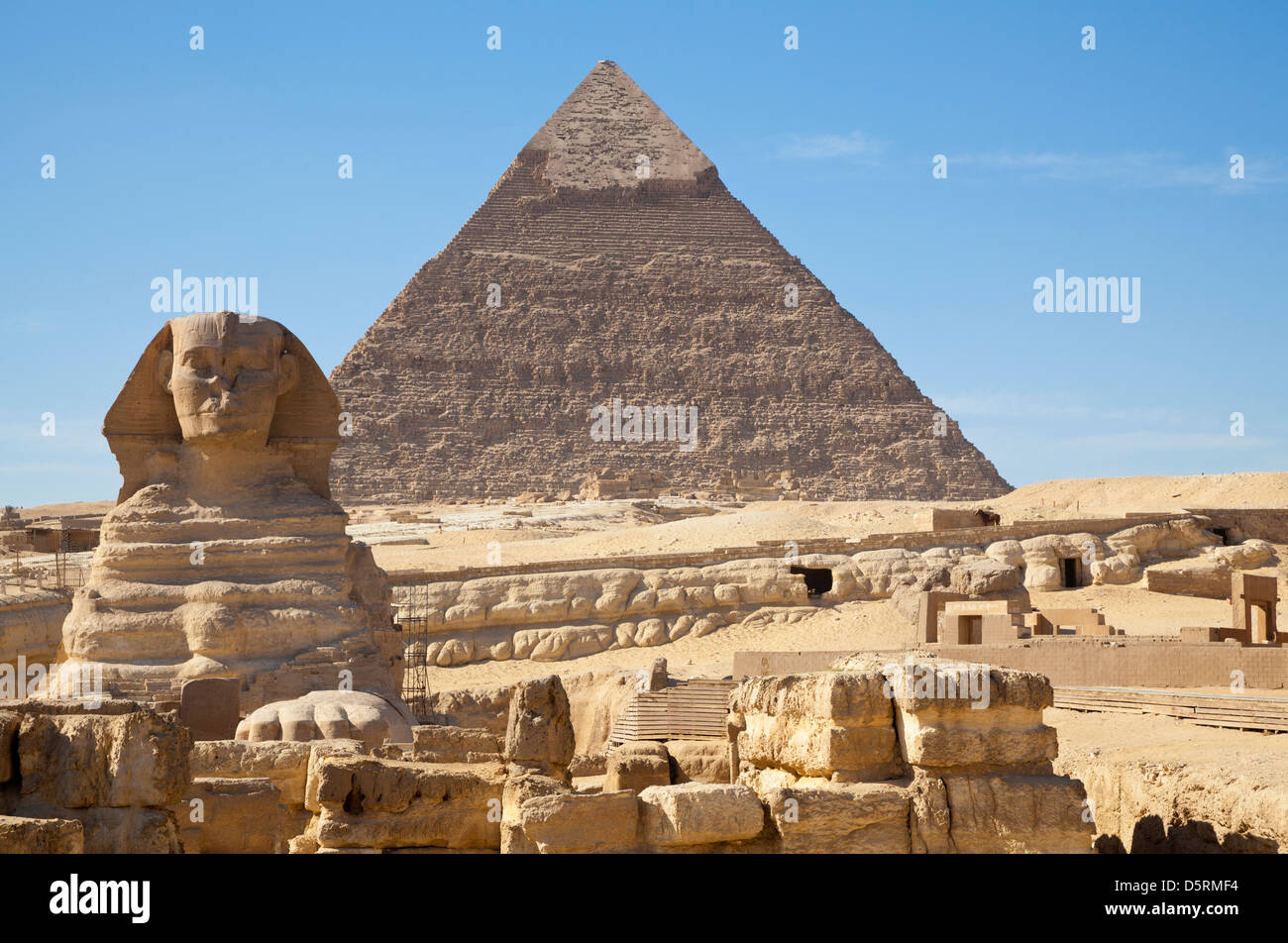 The Great Sphinx with the Pyramid of Khafre behind at Giza in Egypt Stock Photo