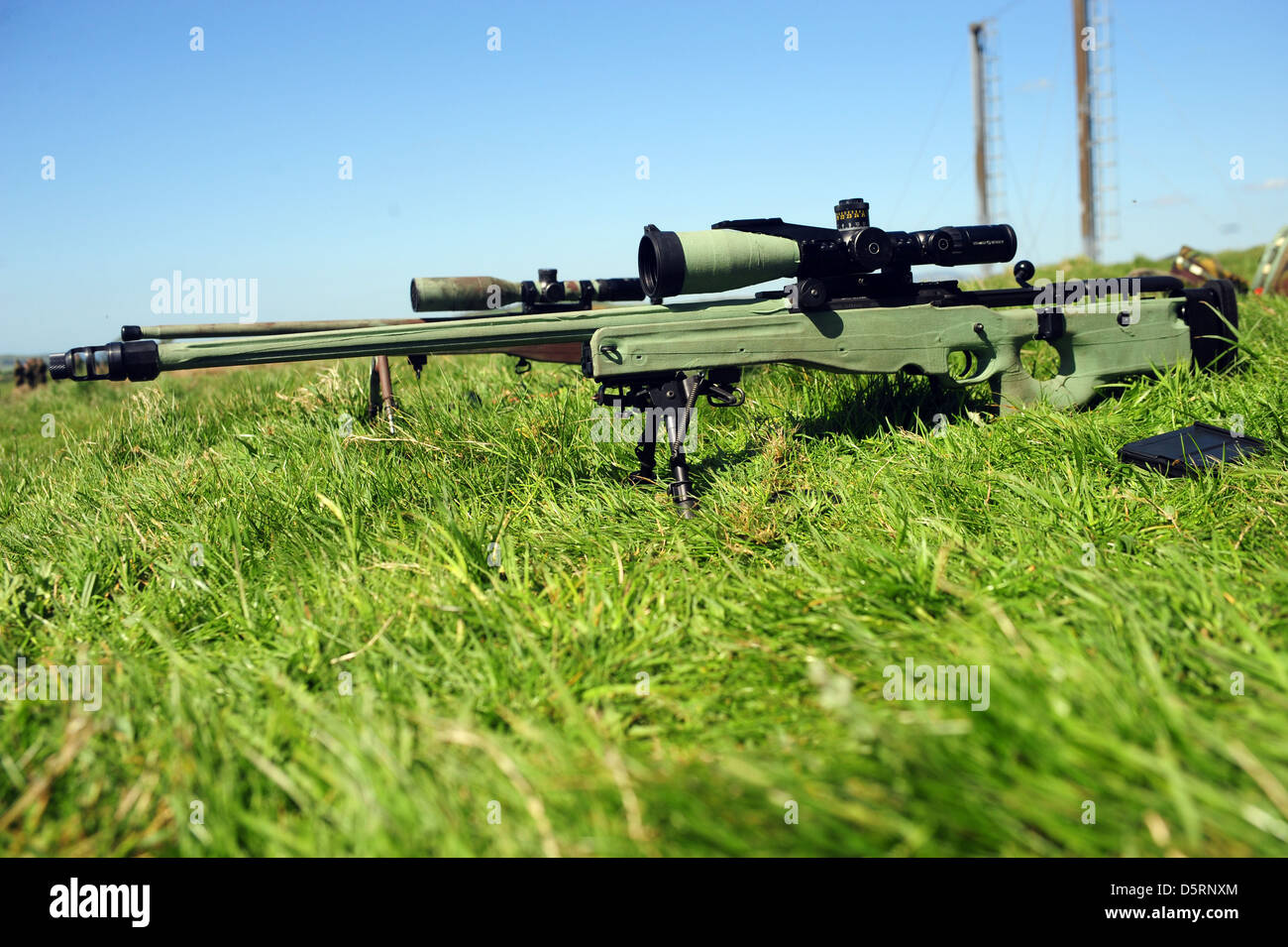 British Sniper with AI L115A3 sniper rifle, Stock Photo