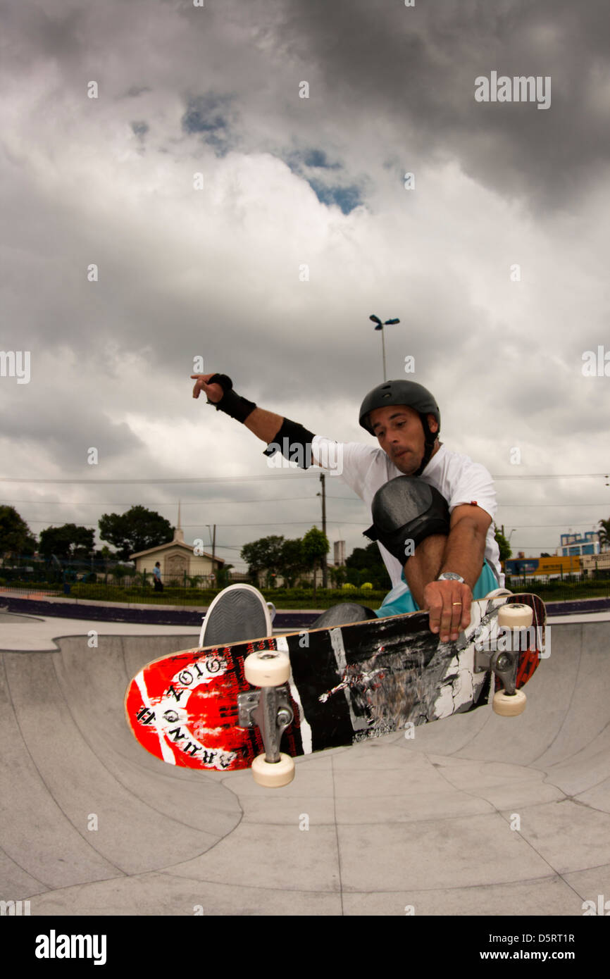 pro rider performing tricks in skateboard at São Bernardo do Campo Skate Park Stock Photo